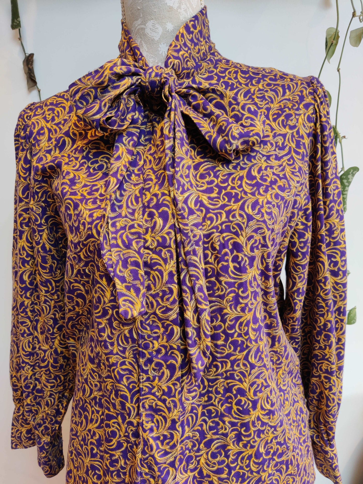 Stunning purple and glod pussy bow blouse