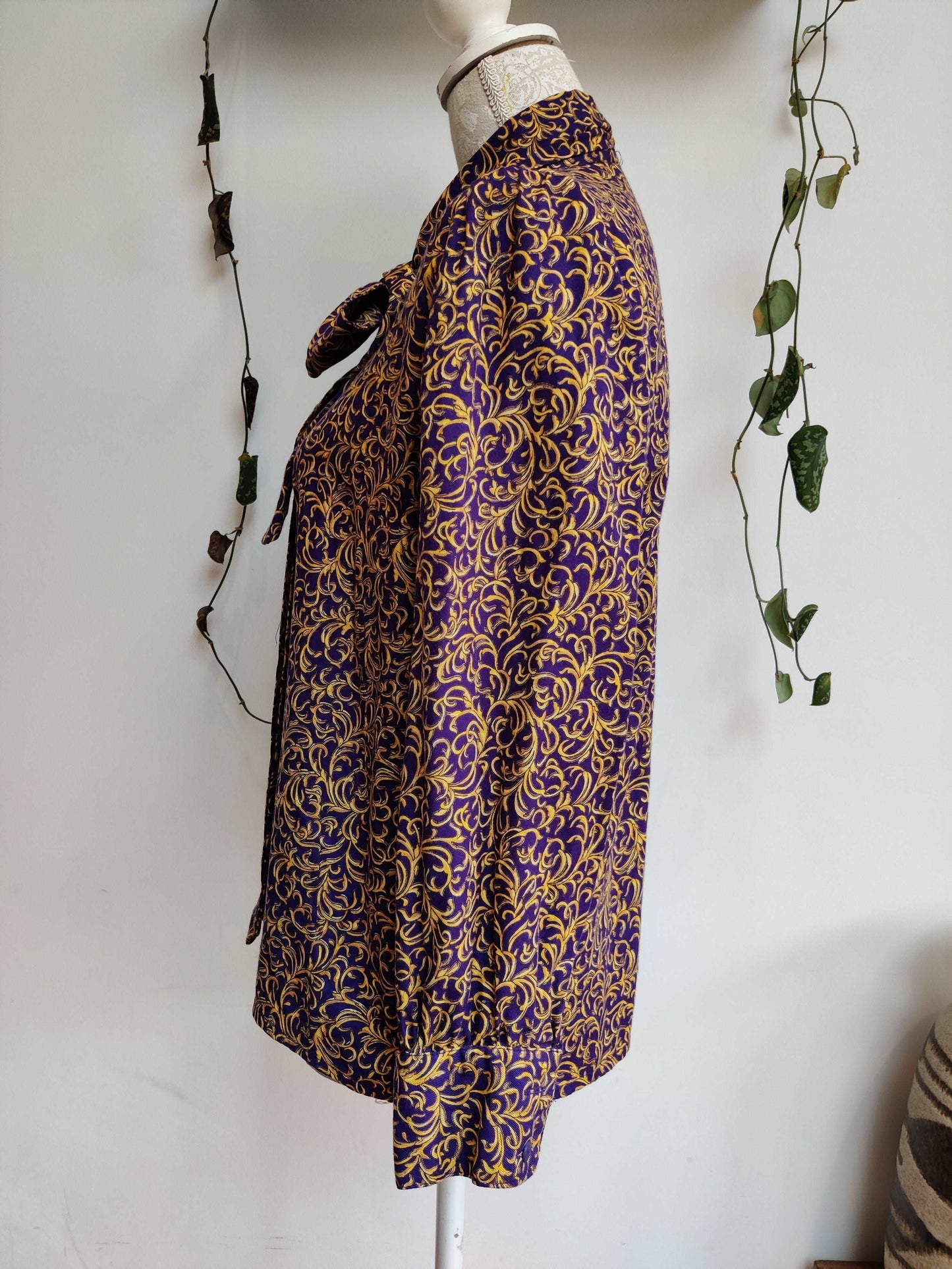 Beautiful 80s pussybow blouse in purple and gold print. Size 12-14.