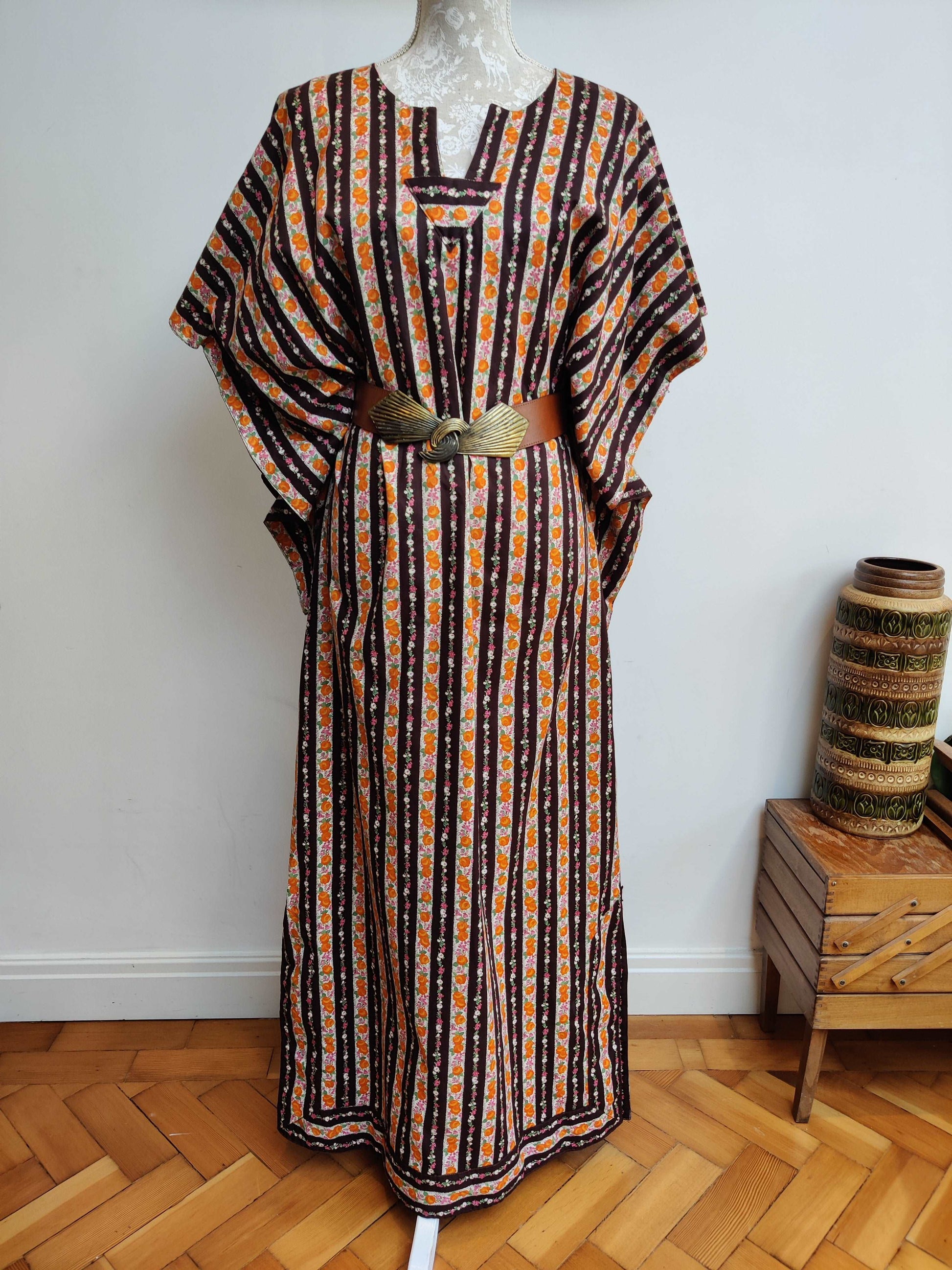 Beautiful floral kaftan with huge sleeves.