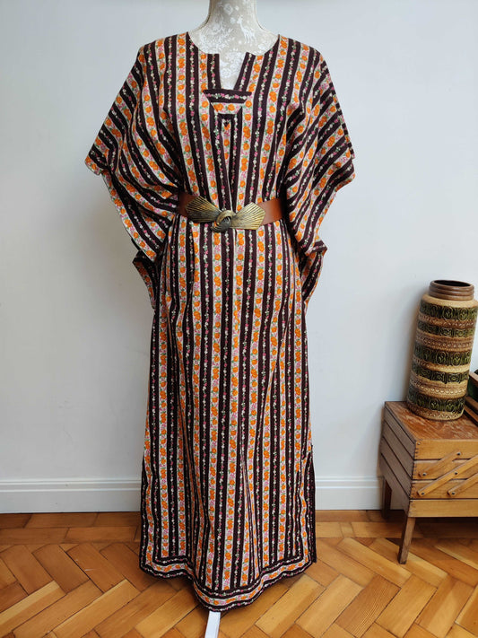 Beautiful floral kaftan with huge sleeves.
