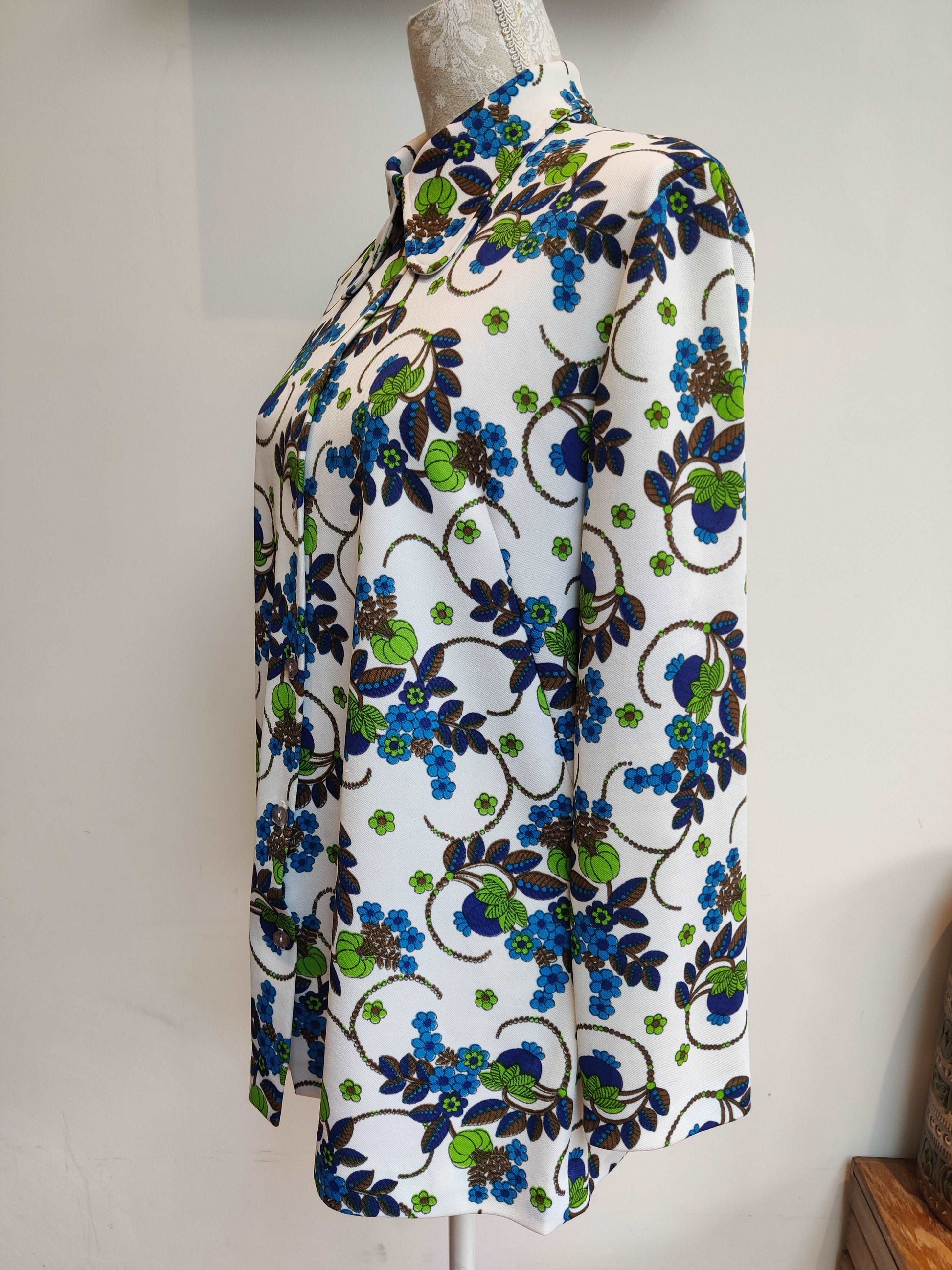 70s floral shirt with dagger collar.