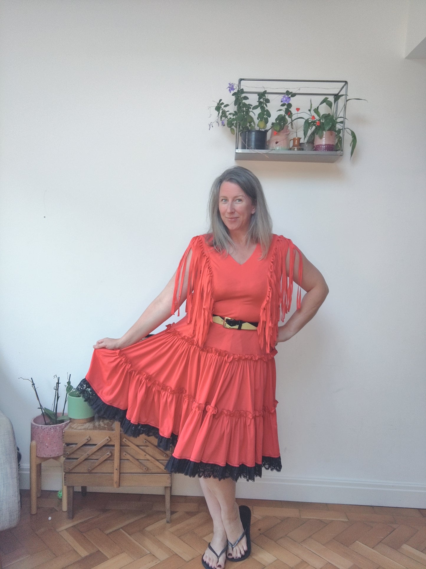 Red and black vintage dress with tassels