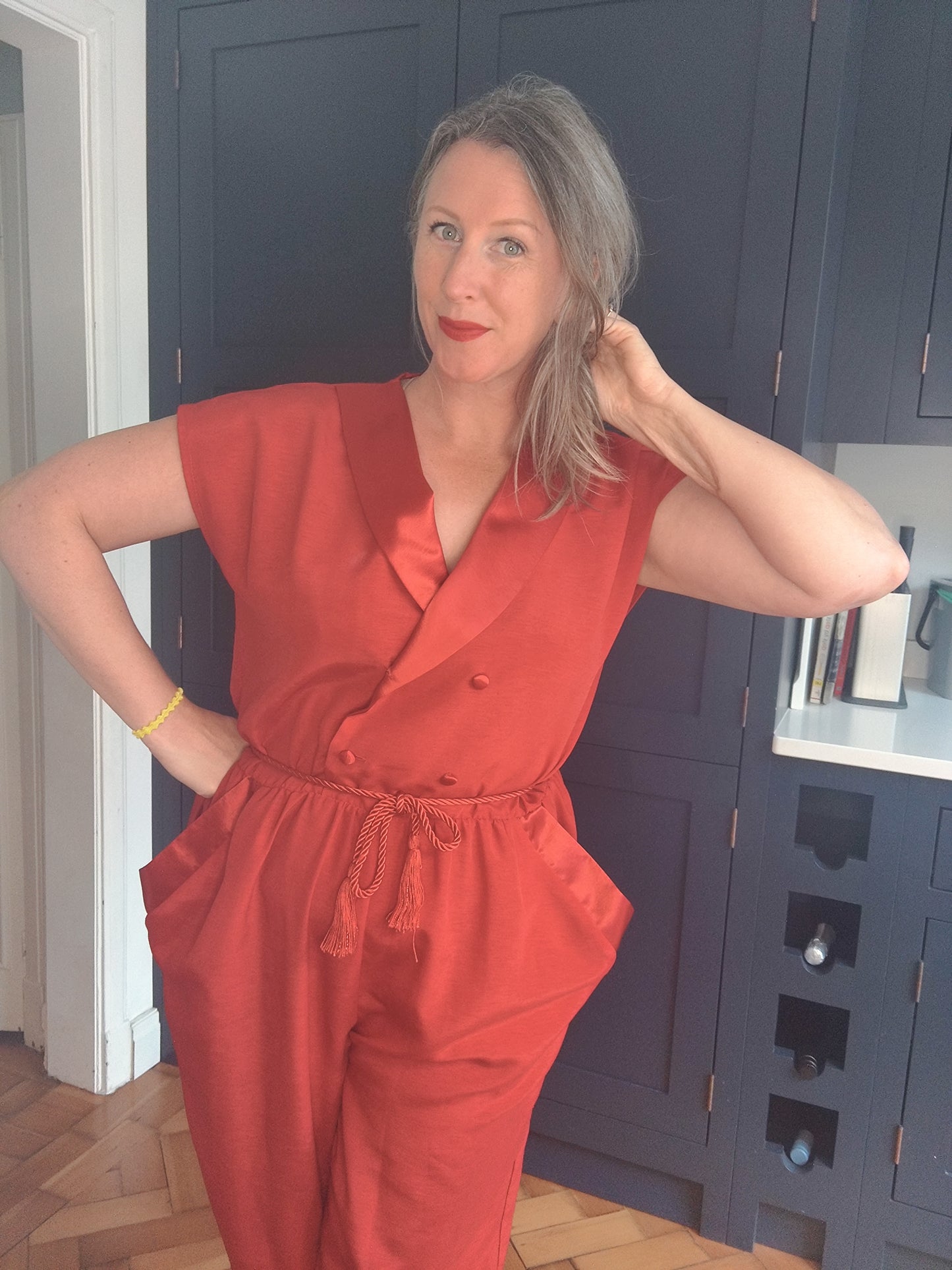 Red 80s jumpsuit 12-14
