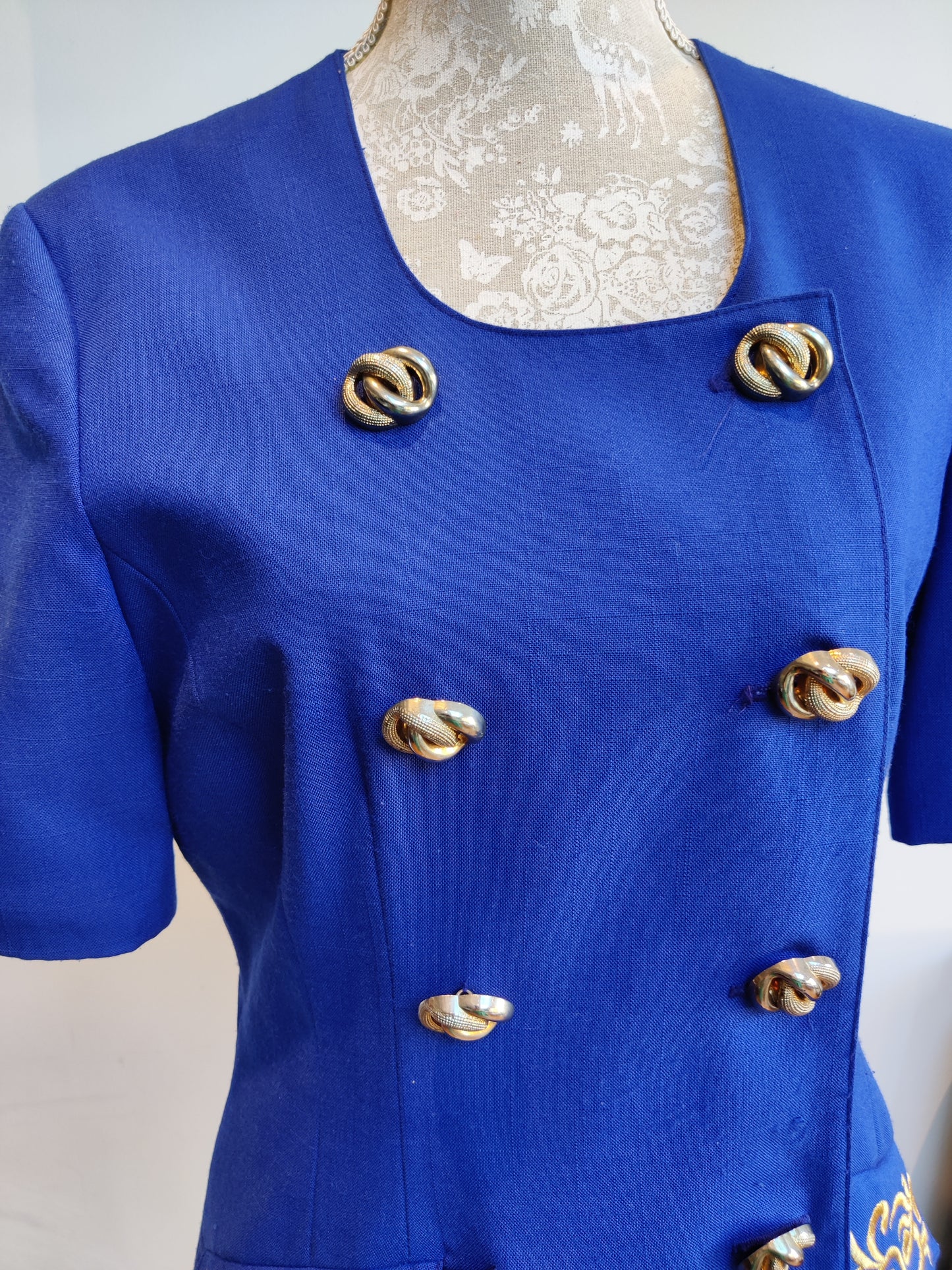 Vintage jacket in blue and gold.