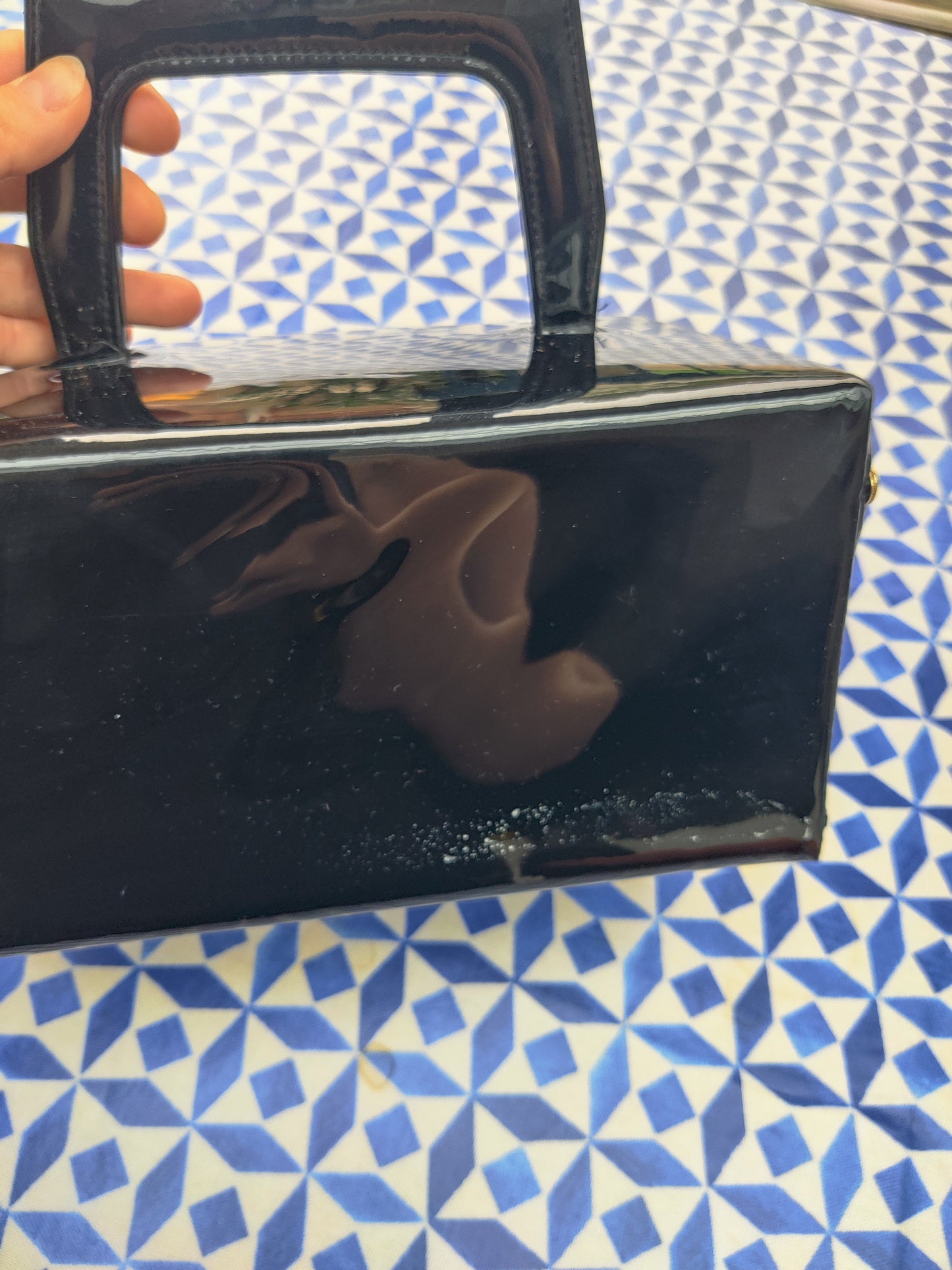 60s vanity case in black and gold.