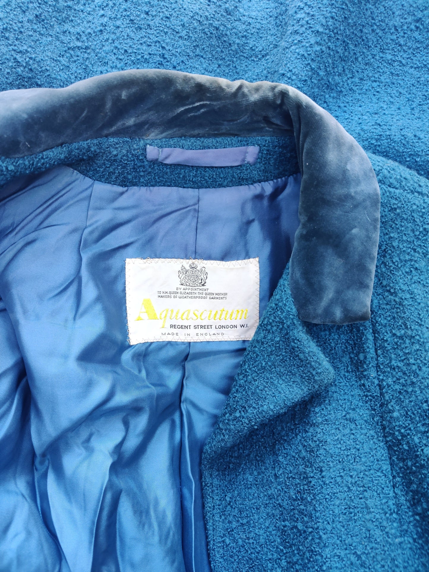 Stunning 1950s Aquascutum coat in blue wool with velvet collar.