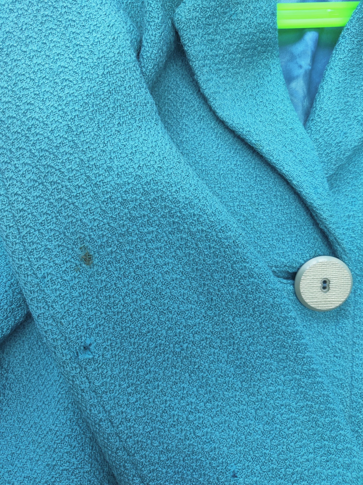 Small mark and holes on arm.
