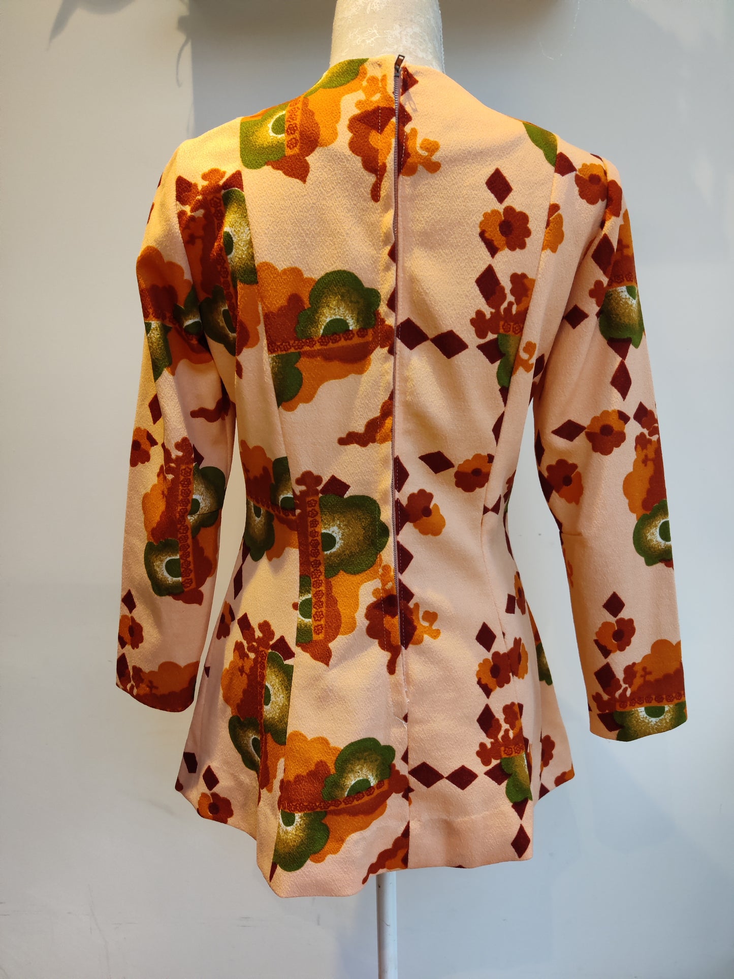 Modette tunic in orange abstract print. Size 10 -12