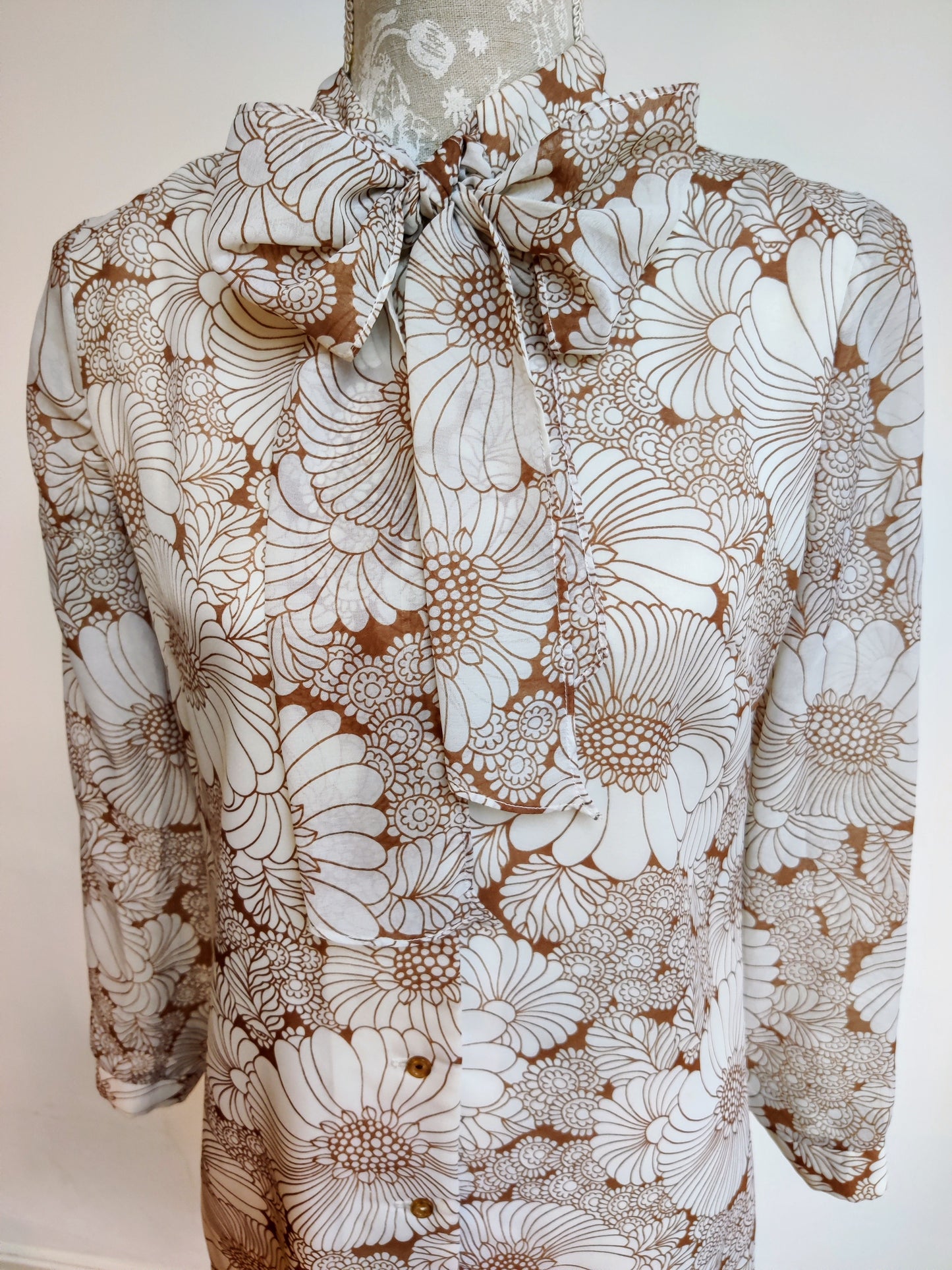 Brown and cream floral midi dress with statement bow