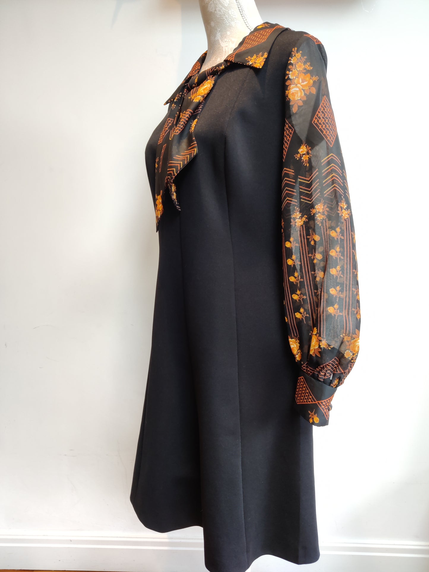 Beautiful Modette dress in black and orange.