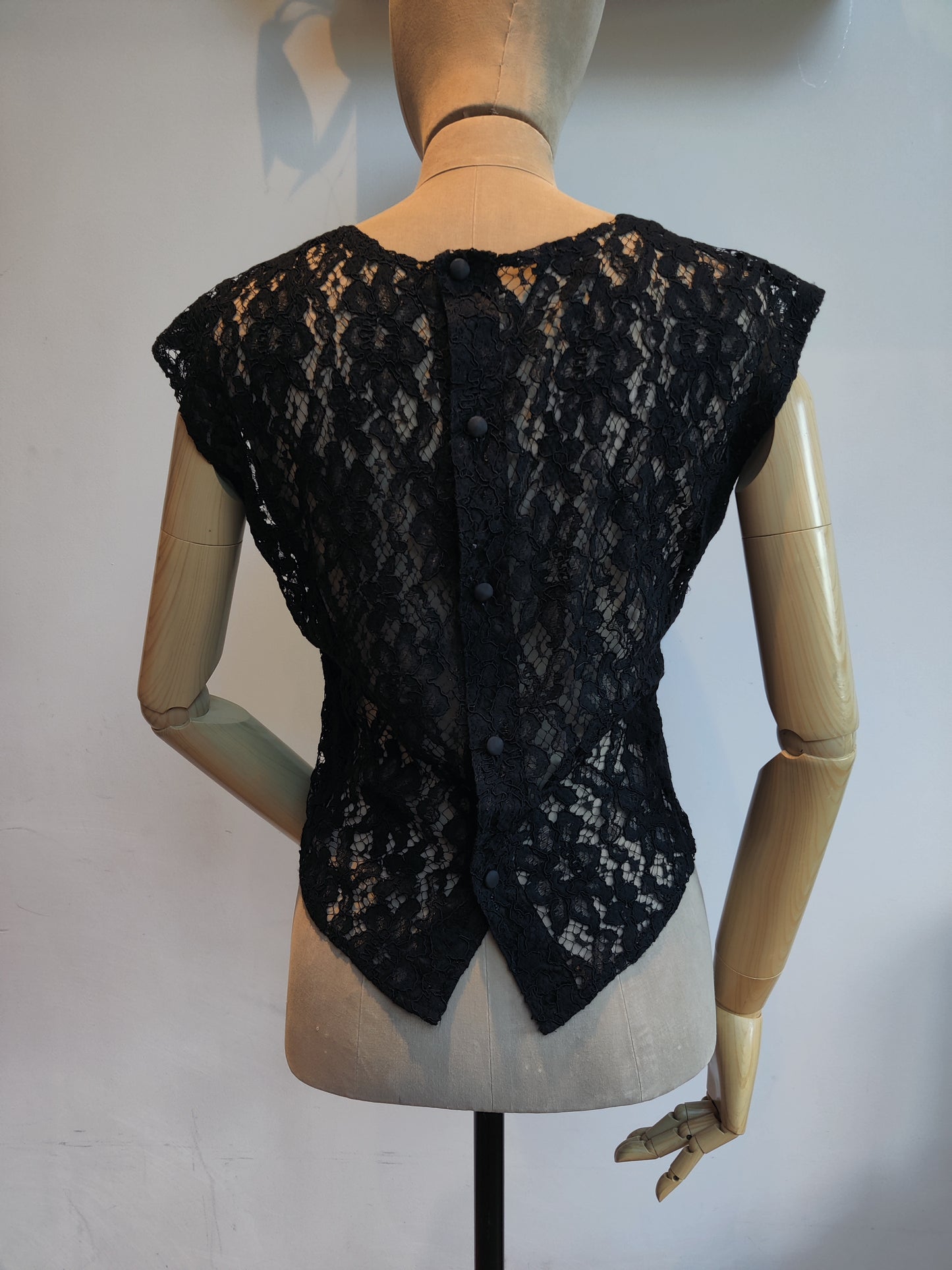 Vintage black lace bodice top with button back.