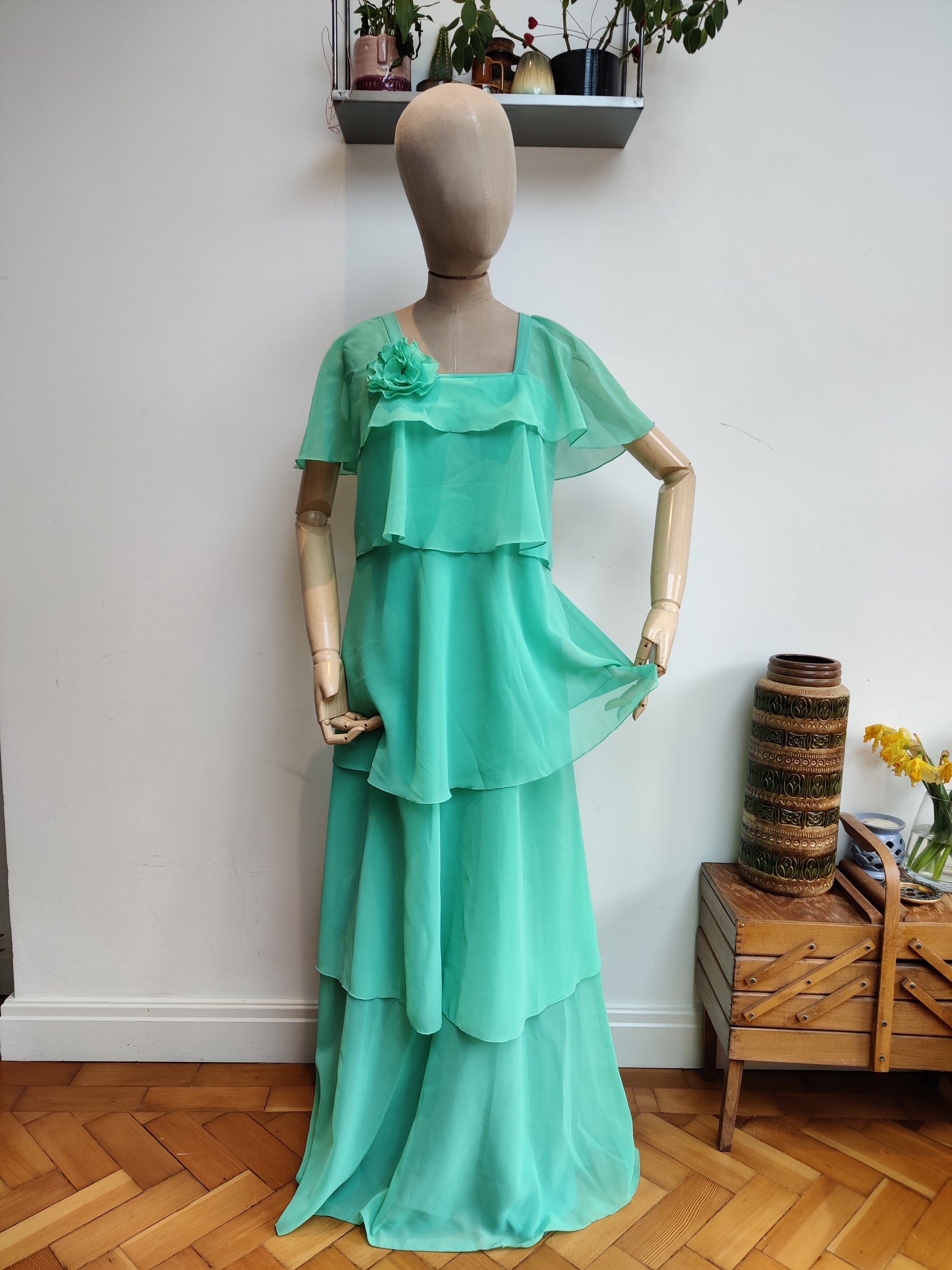Stunning mint green vintage maxi dress with flower corsage.