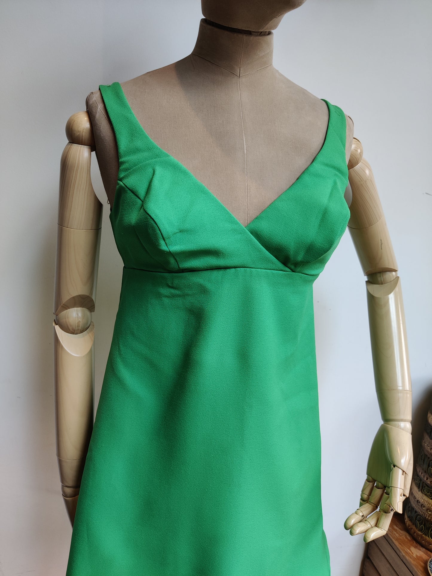 wrap over style mini dress in vibrant green
