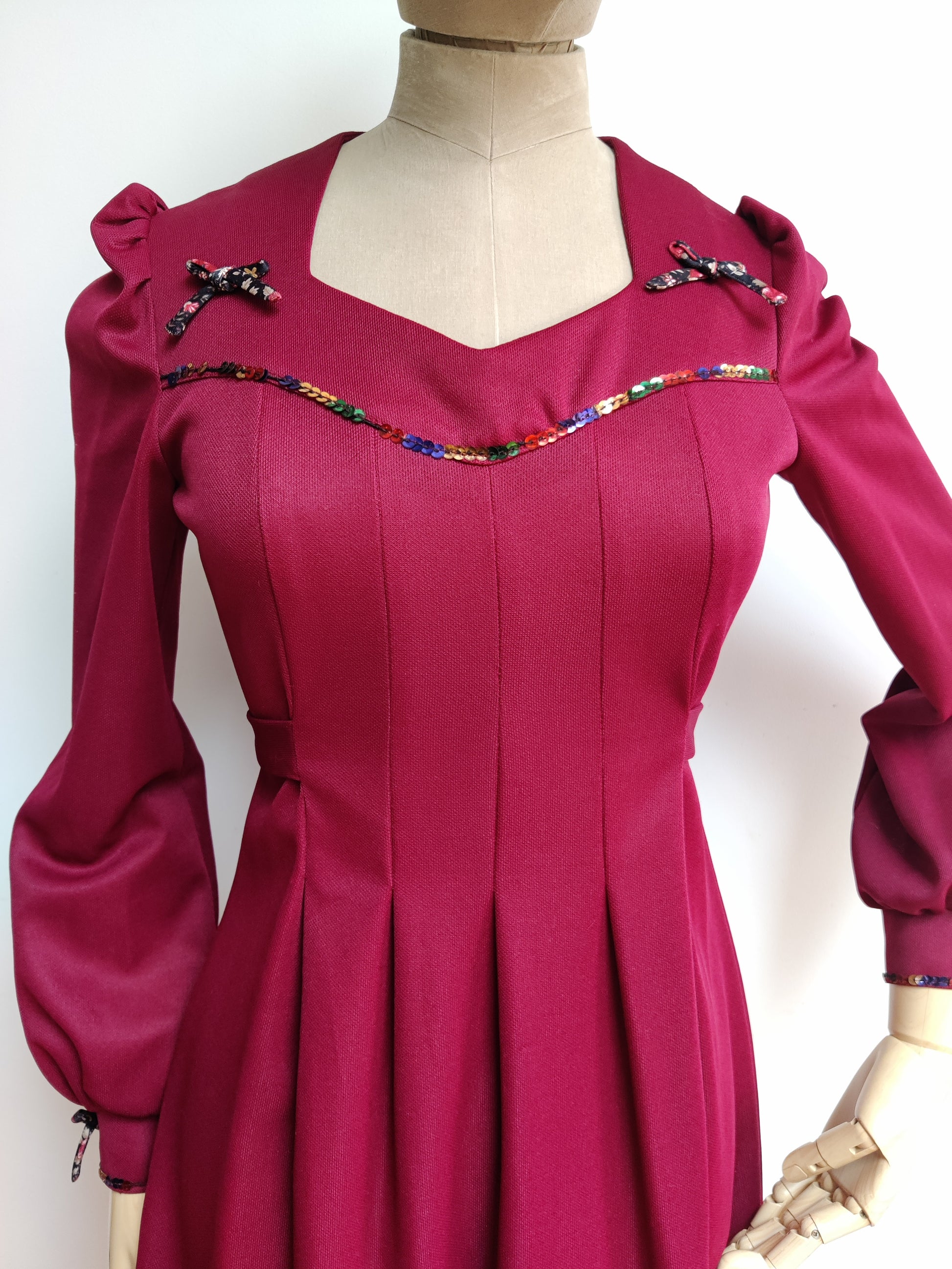 Stunning size 10 burgundy dress with pretty bows