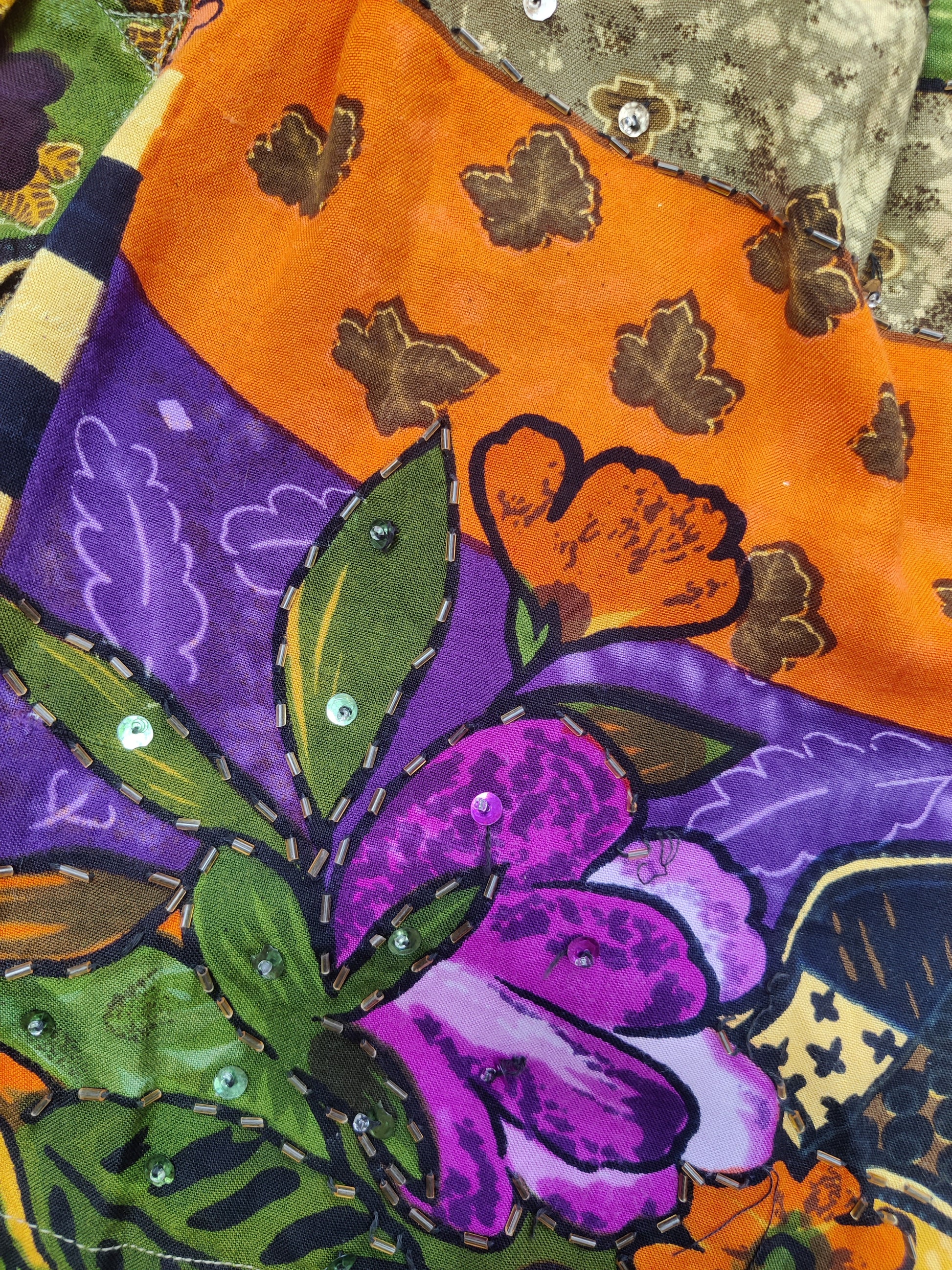 Stunning vintage print with beading.