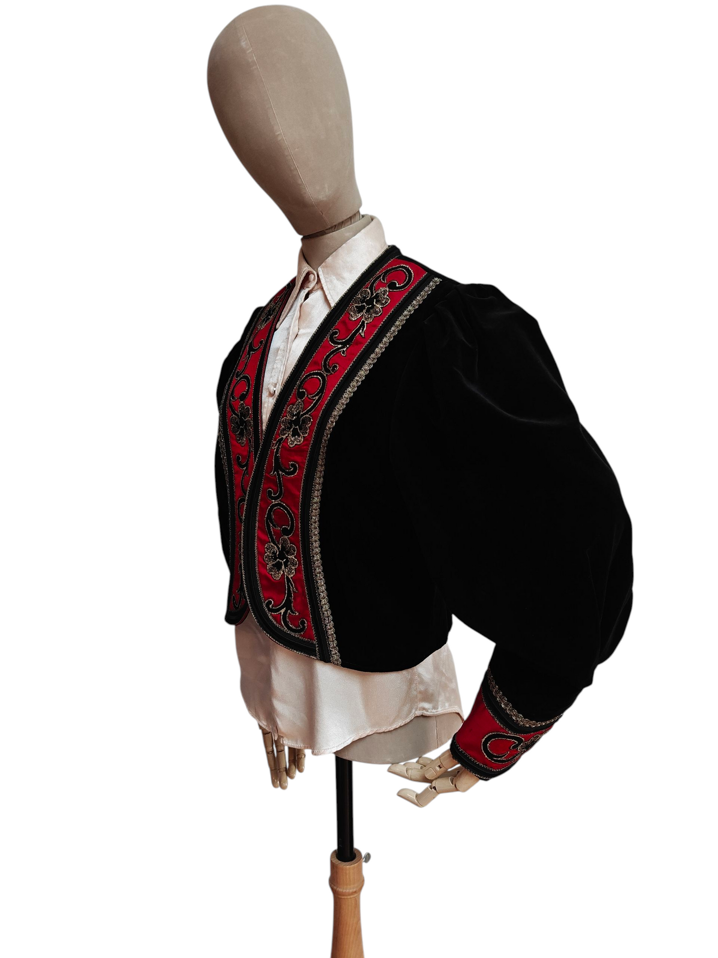 Black velvet jacket with red and gold embroidery trim