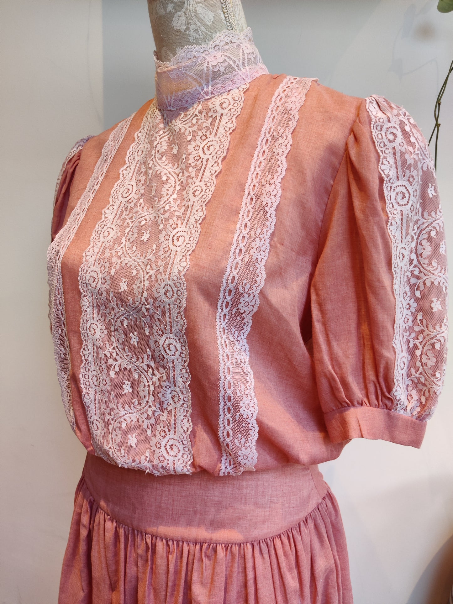 Lace trim pink midi dress.