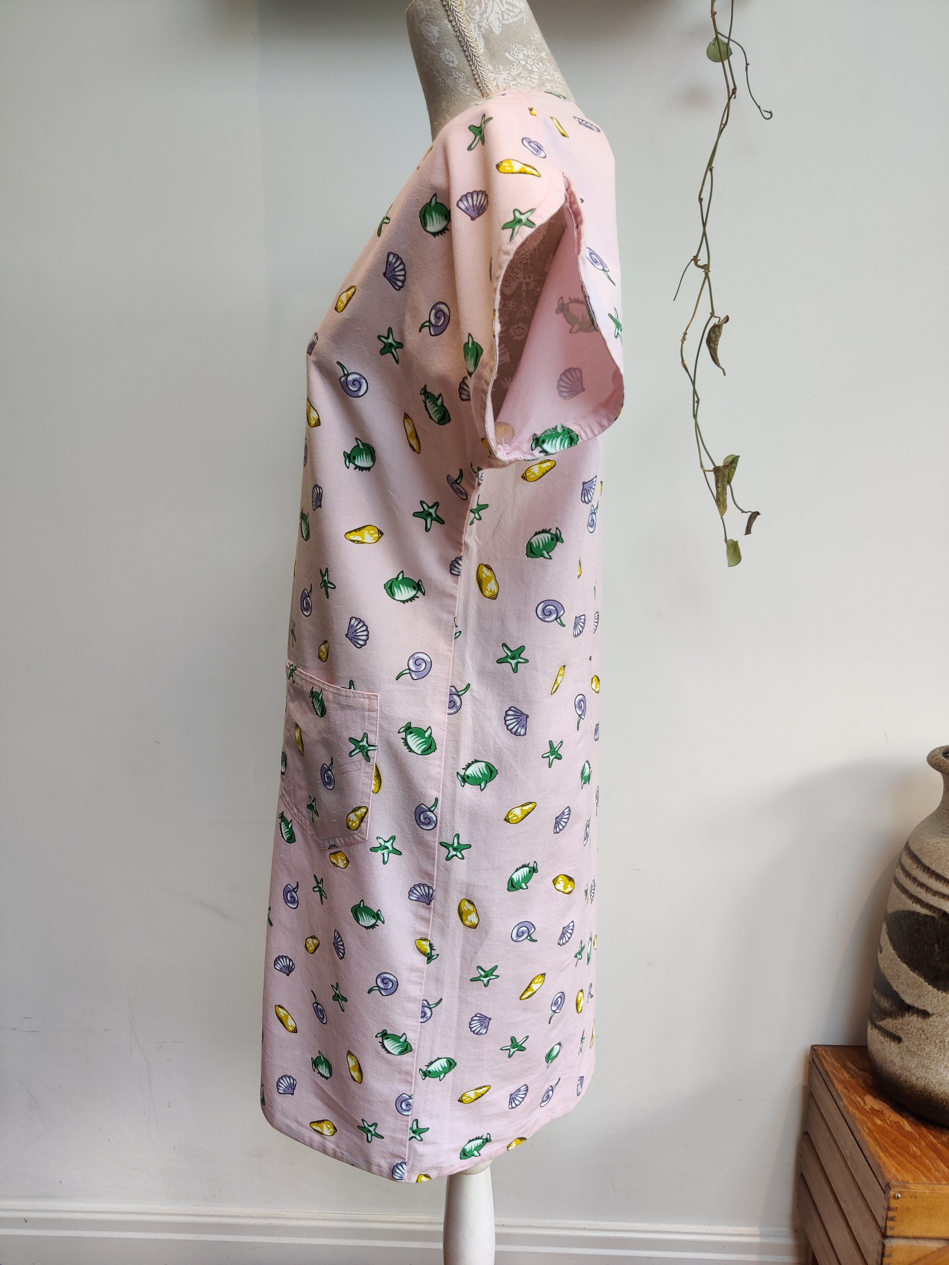 80s pink dress with sea shell print.