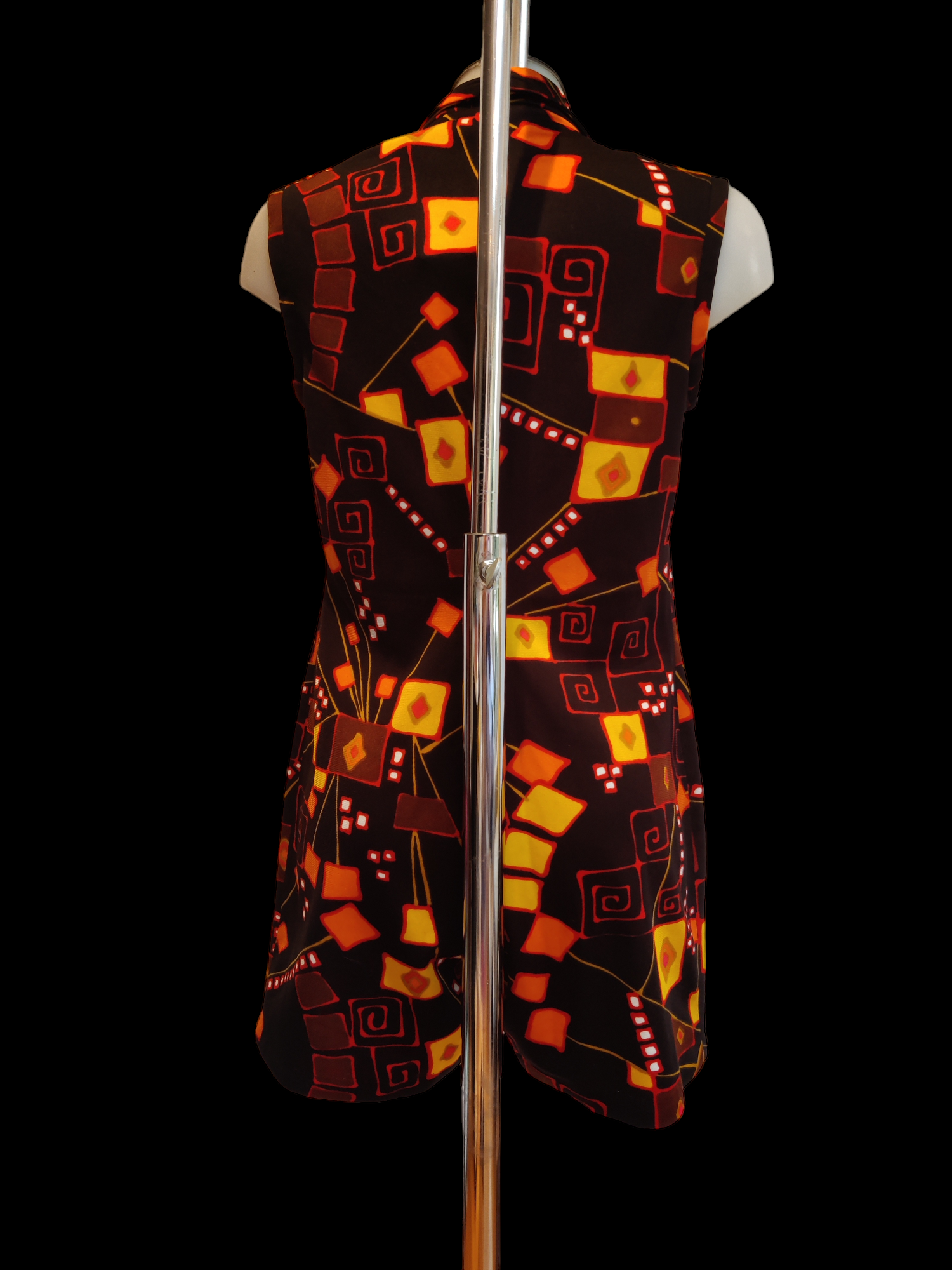 Fabulous sleeveless vintage playsuit with fun print in Black, orange and yellow.