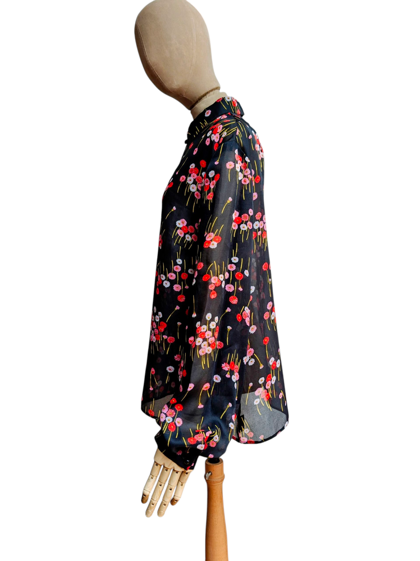 Black and pink daisy blouse with statement sleeves. Size 16.