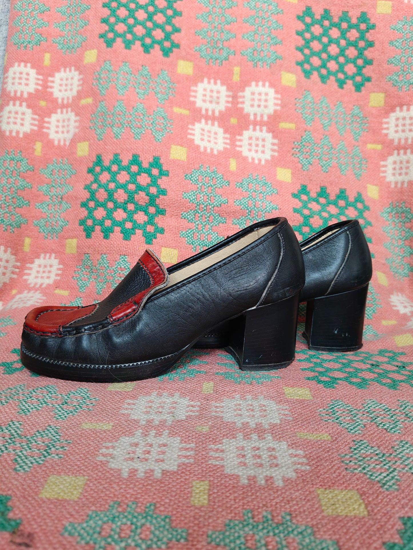 Black 60's loafers with orange swirl detail