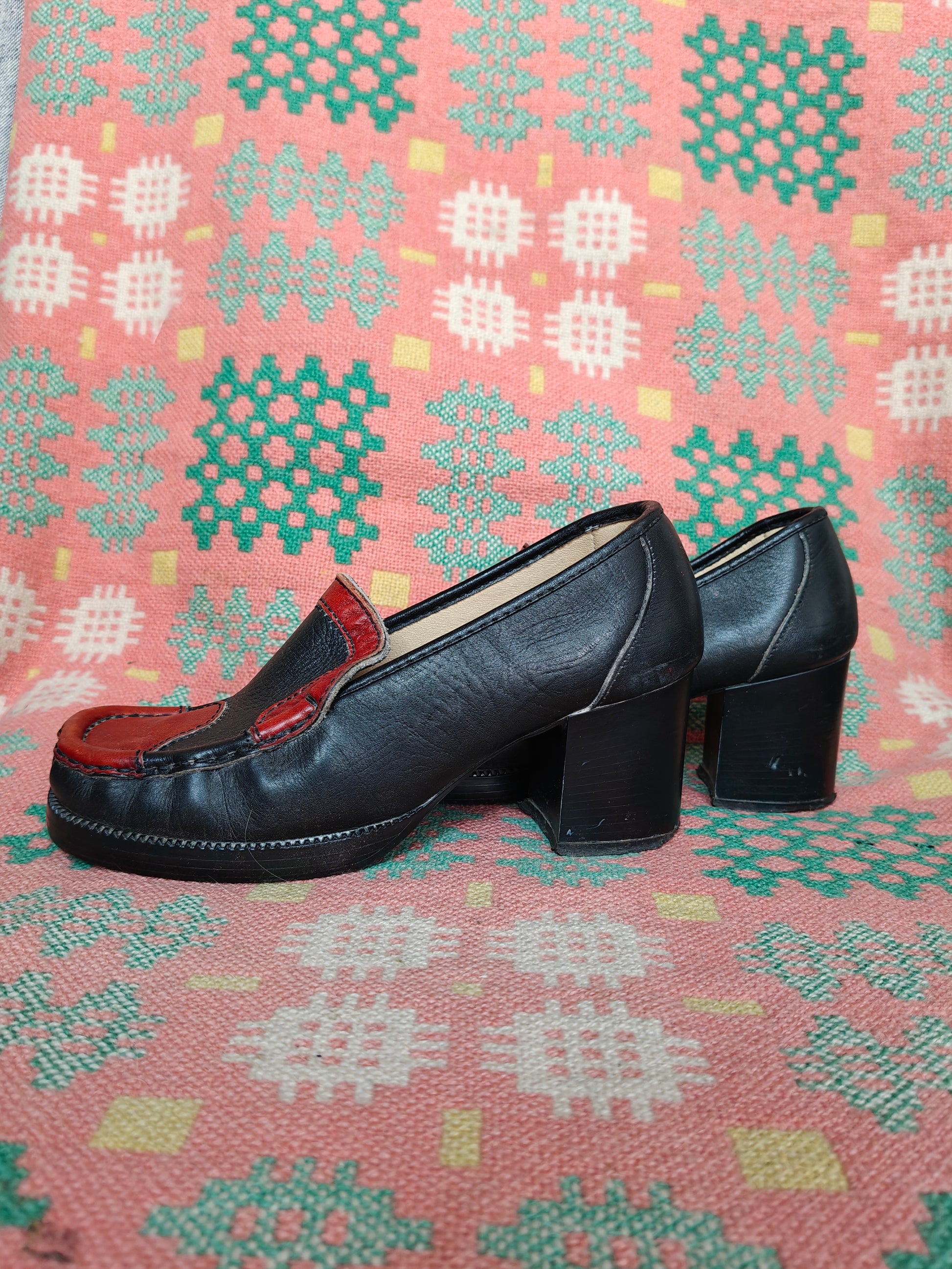 Black 60's loafers with orange swirl detail