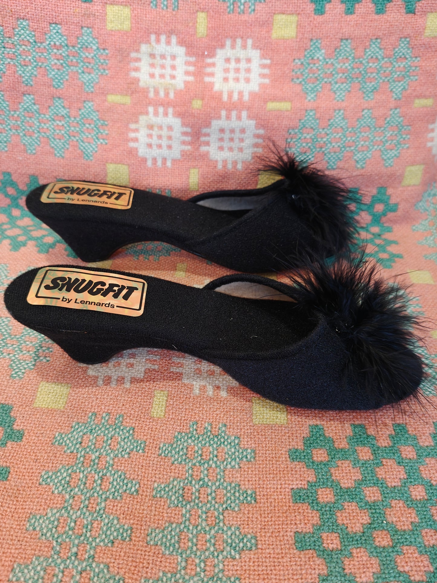 Black peep toe wedge shoes with feather pom pom
