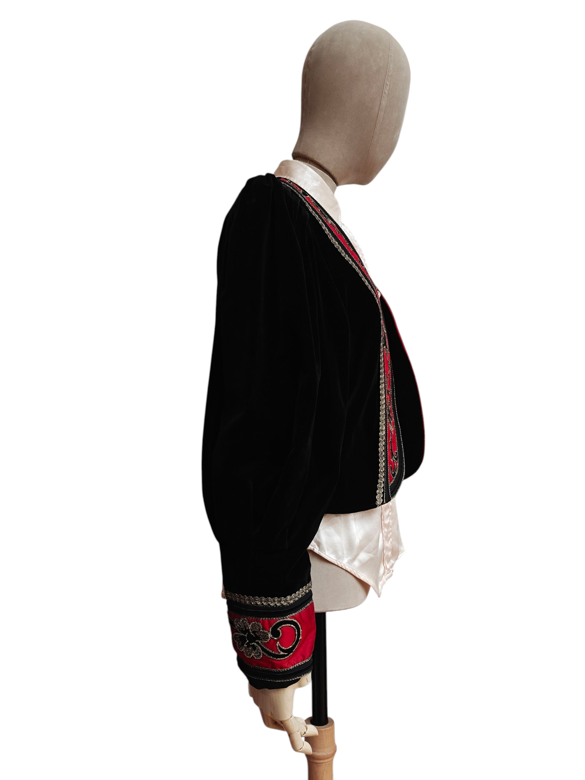 Black velvet jacket with red trim and gold embroidery