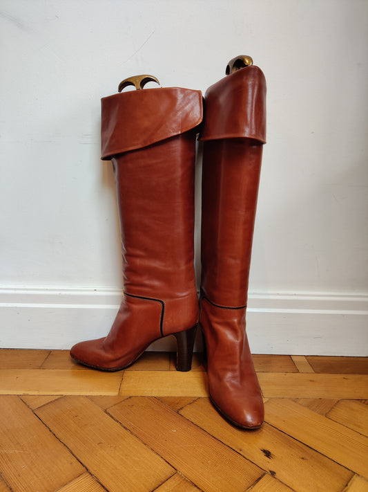 Brown Italian leather high heels boots.