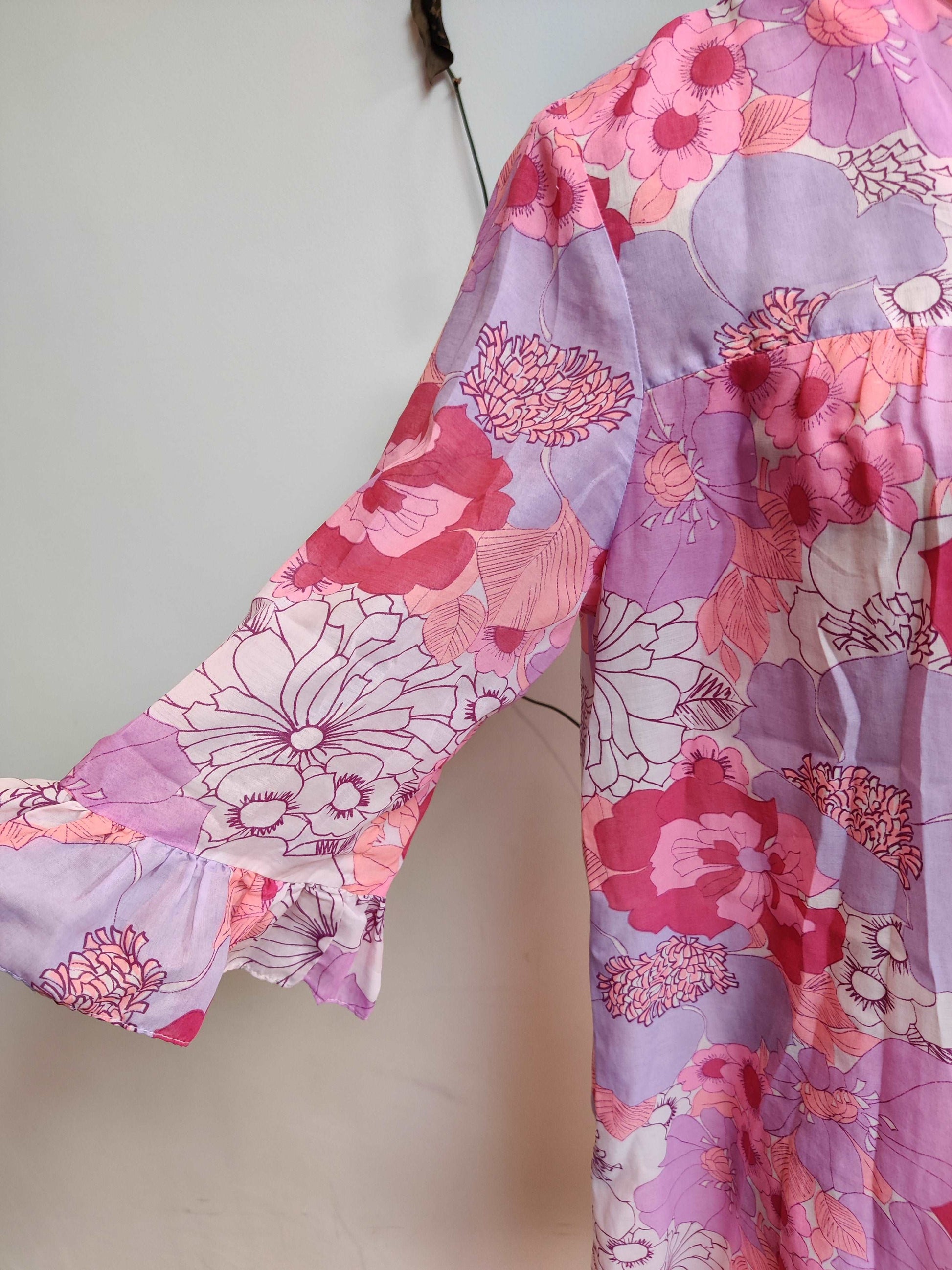 Beautiful vintage pink floral house coat dress.