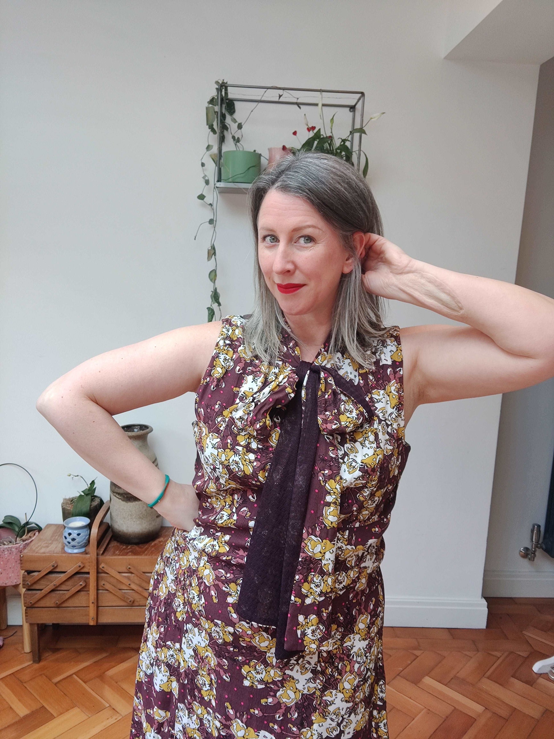 Gorgeous pussy bow dress in brown floral print.