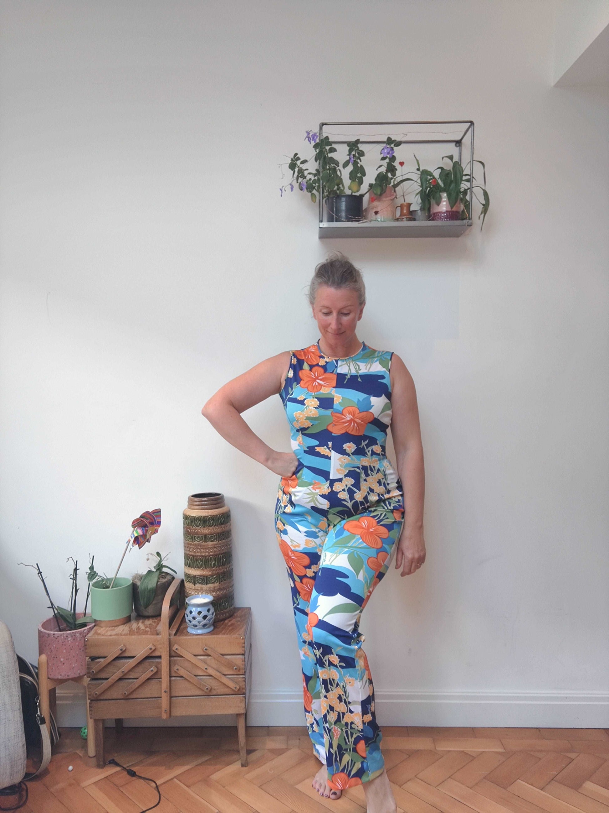 The best 70s jumpsuit with floral print and matching over dress