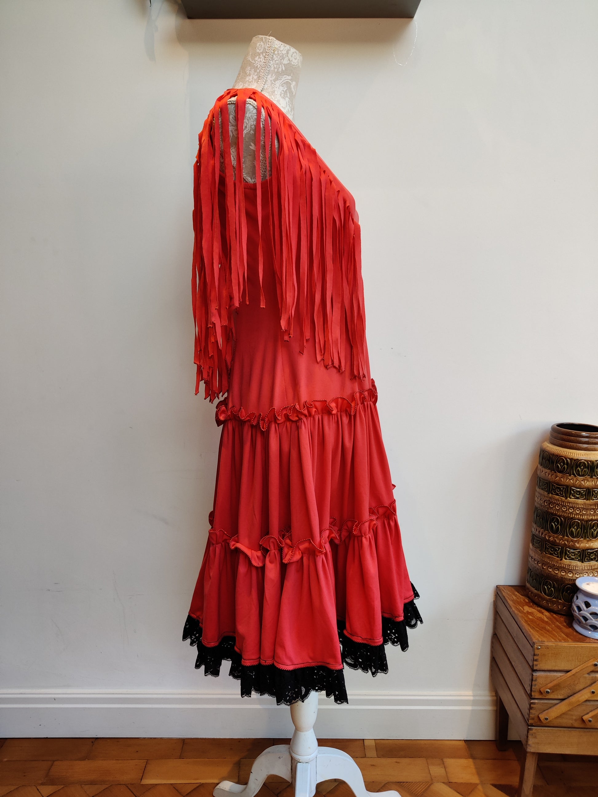 Red tassel dress with tiered lace detail