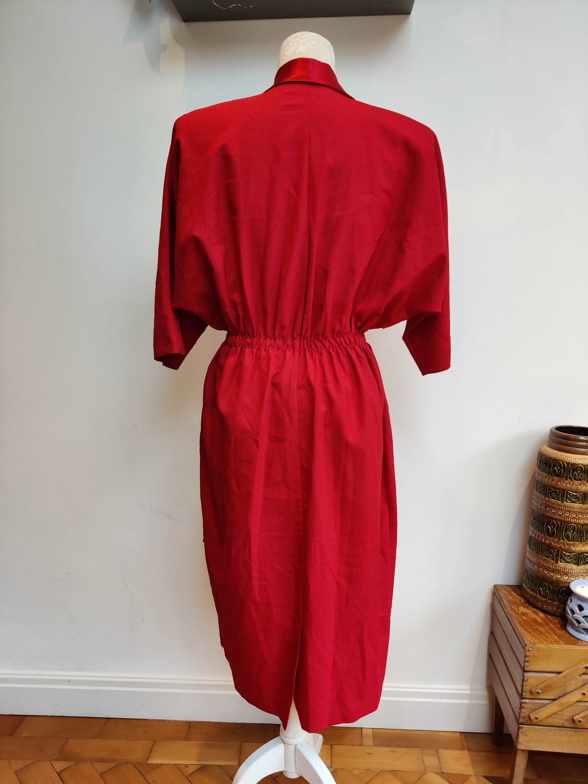 Vintage red dress with double breasted design.