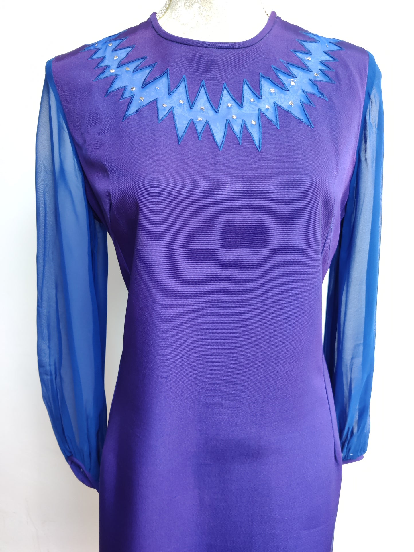 Incredible 60s dress with lightening bolt chiffon detail.
