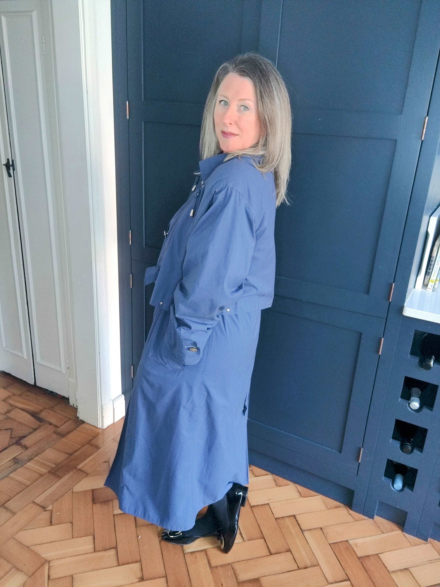 80s navy trenchcoat by Four Seasons. Size 12-14.