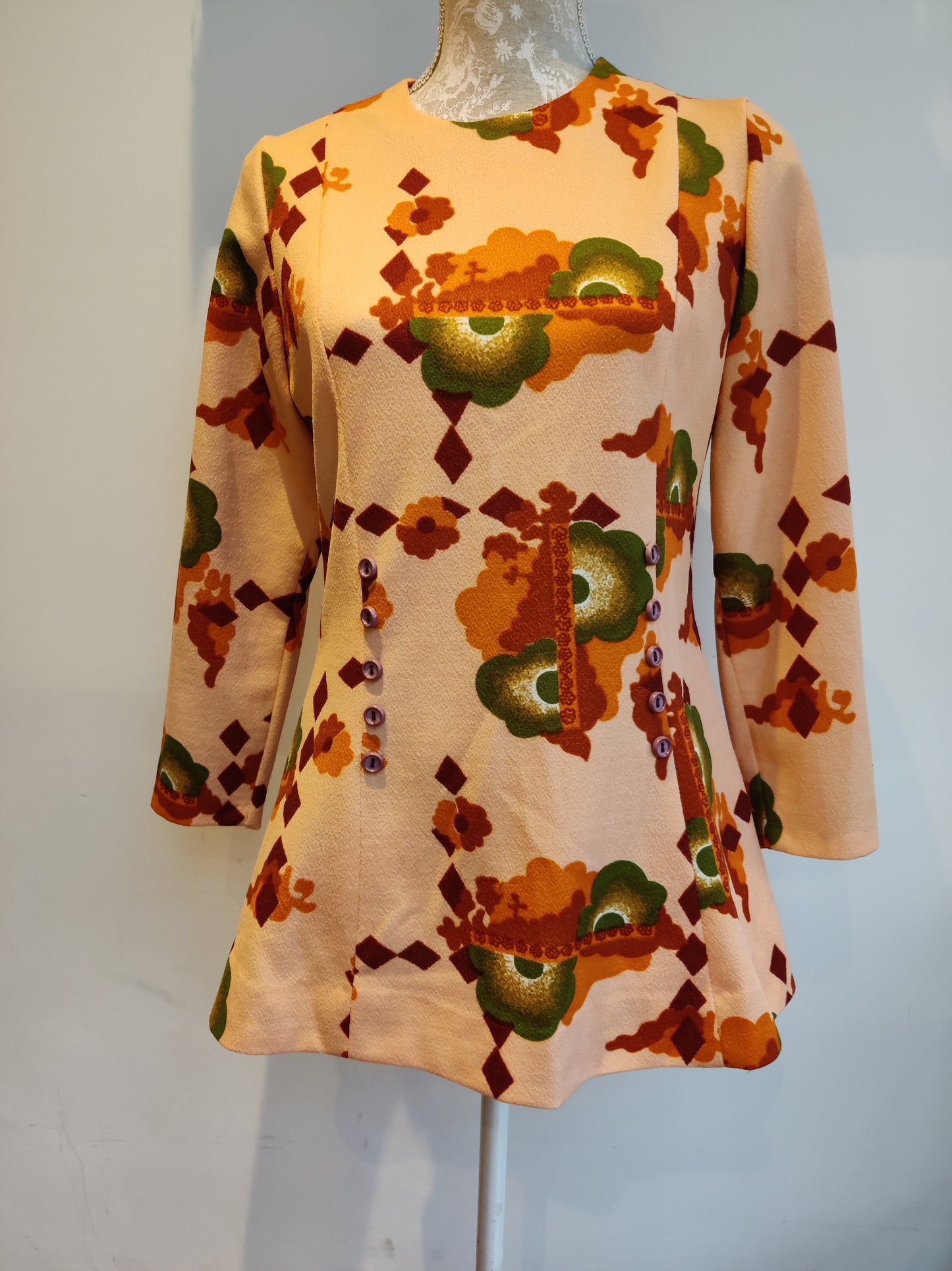 Modette tunic in orange abstract print. Size 10 -12