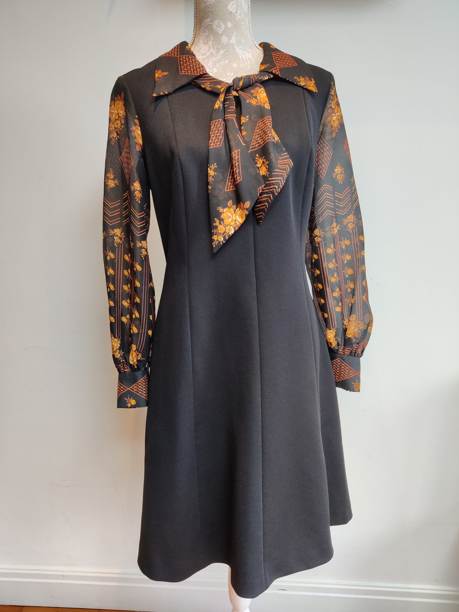 Black and orange vintage dress with dagger collar