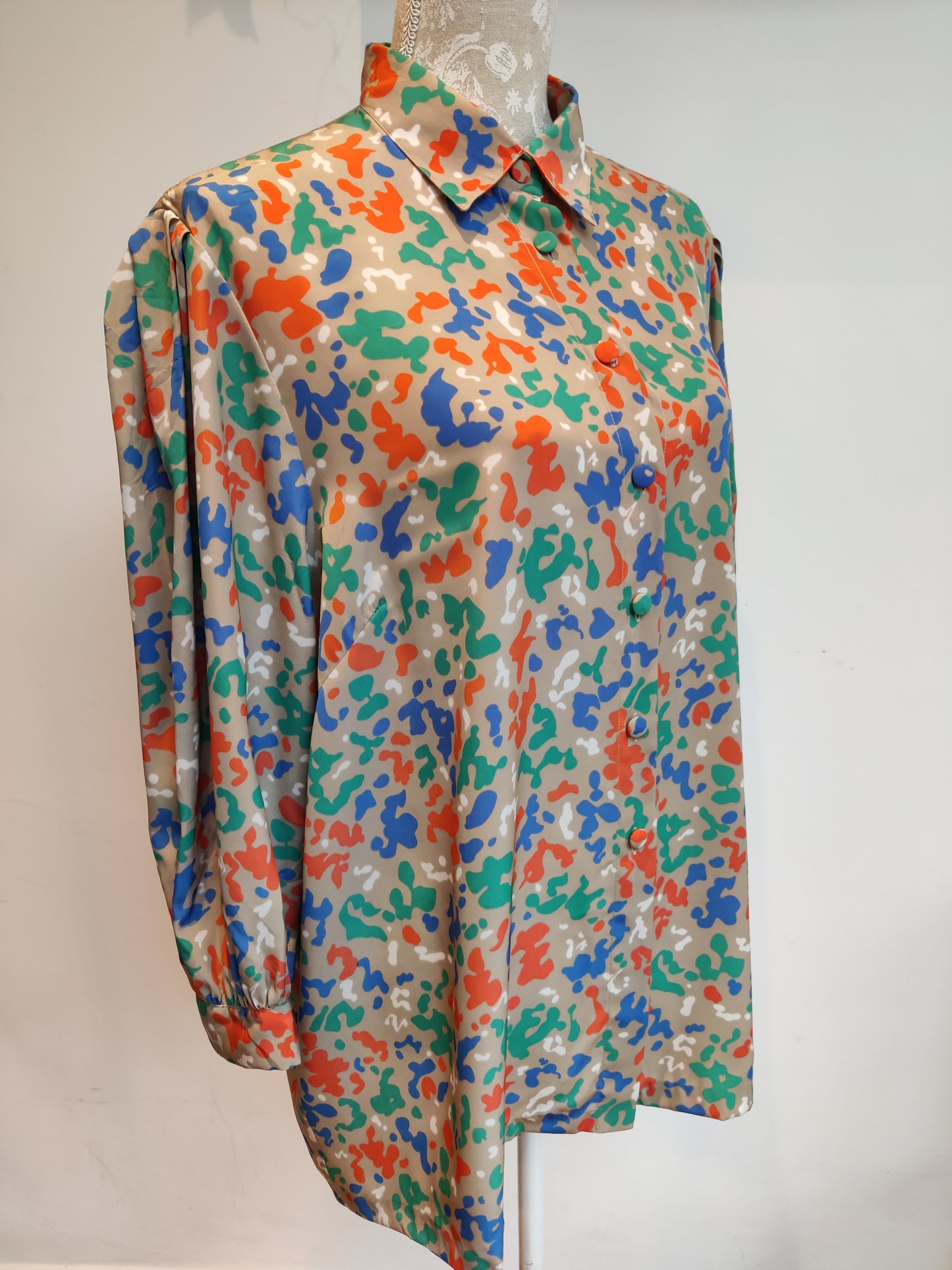 Orange, blue and green camouflage shirt