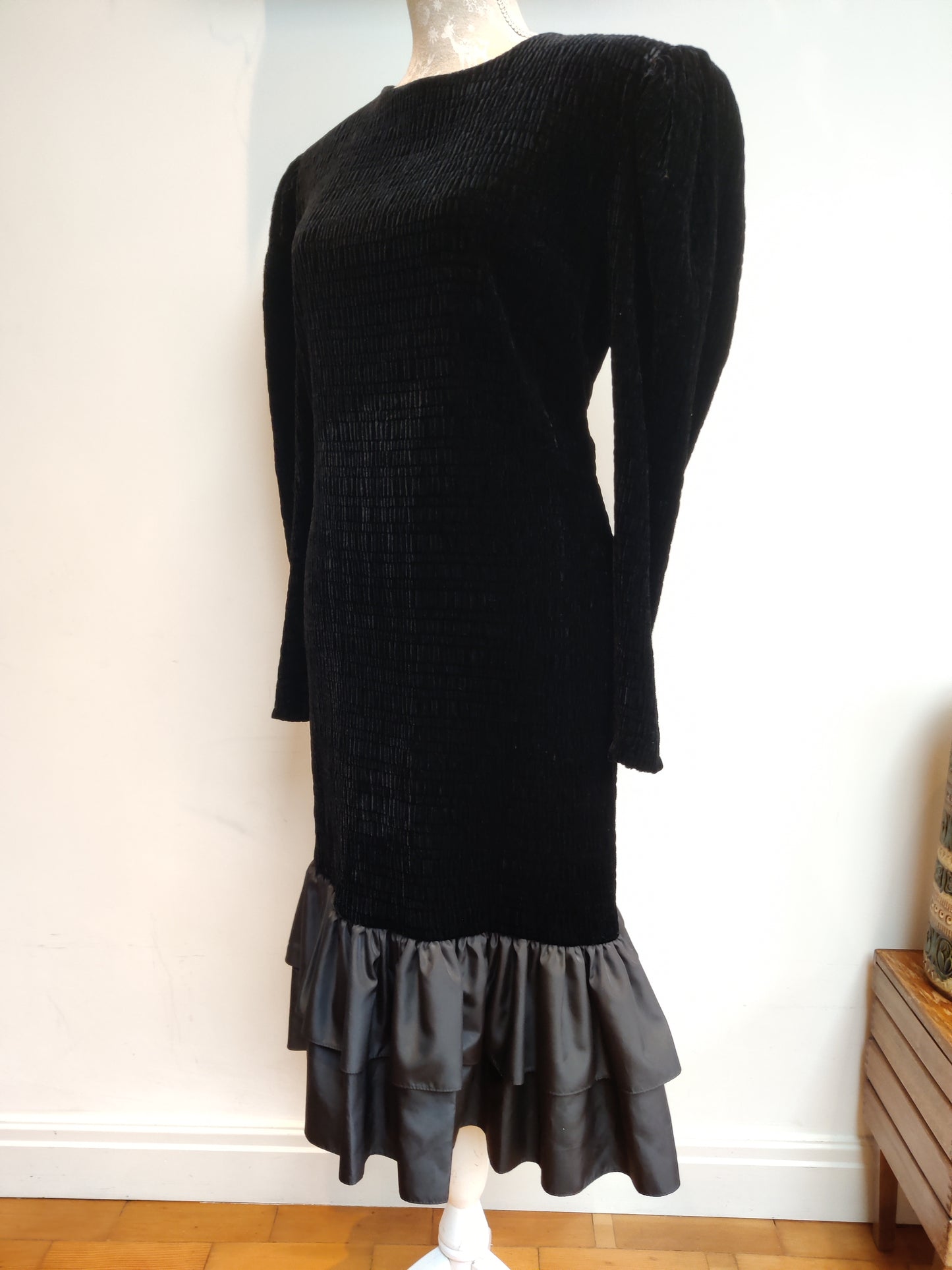 Black velvet dress with taffeta frill. 16