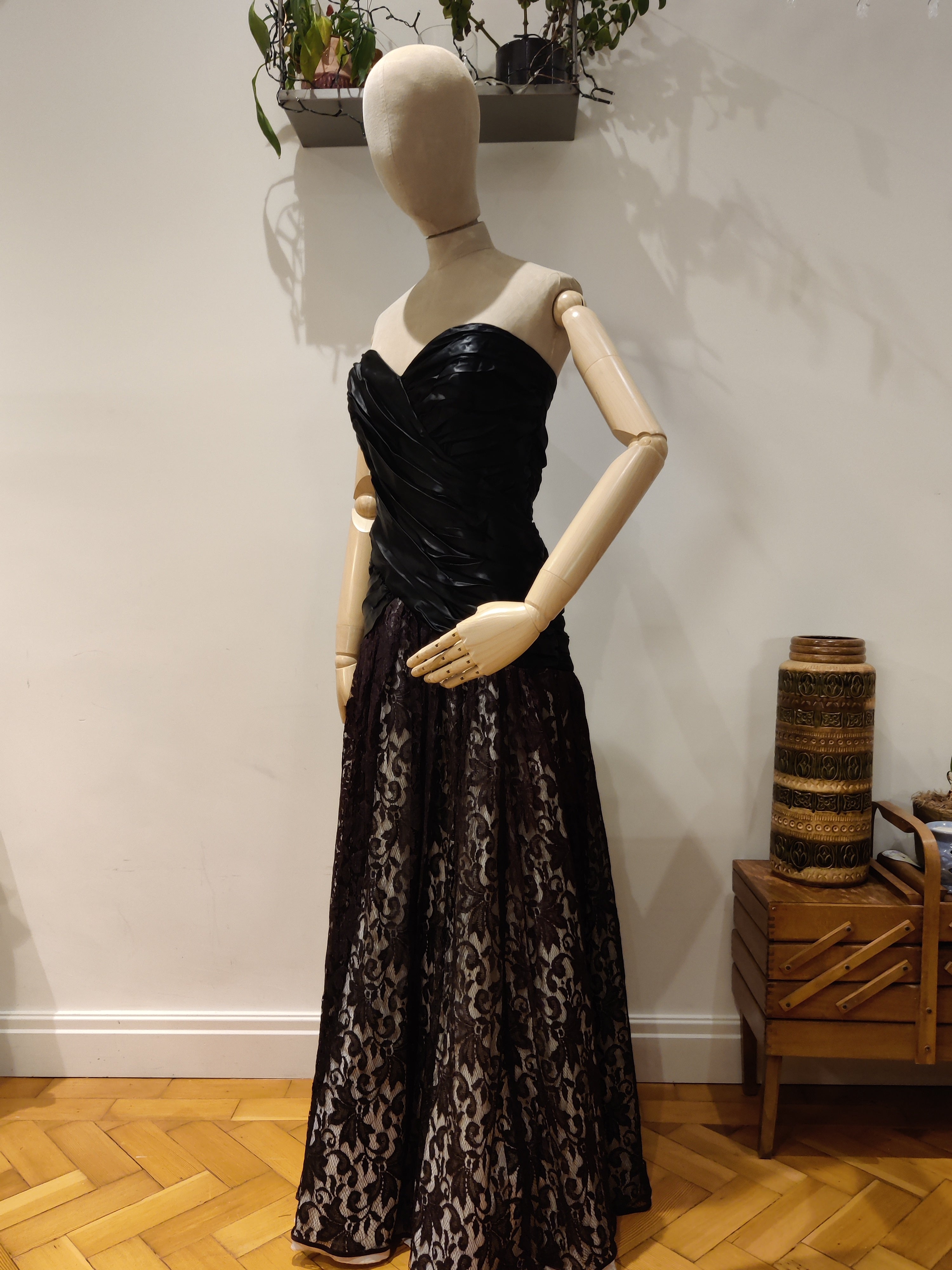 Beautiful black lace strapless bodice evening gown by John Charles. Size 10 12