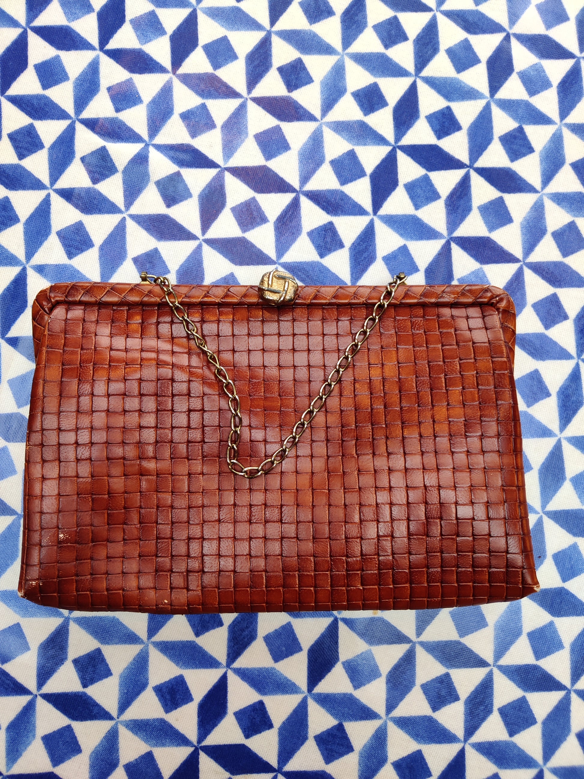 Vintage woven leather clutch bag with gold chain