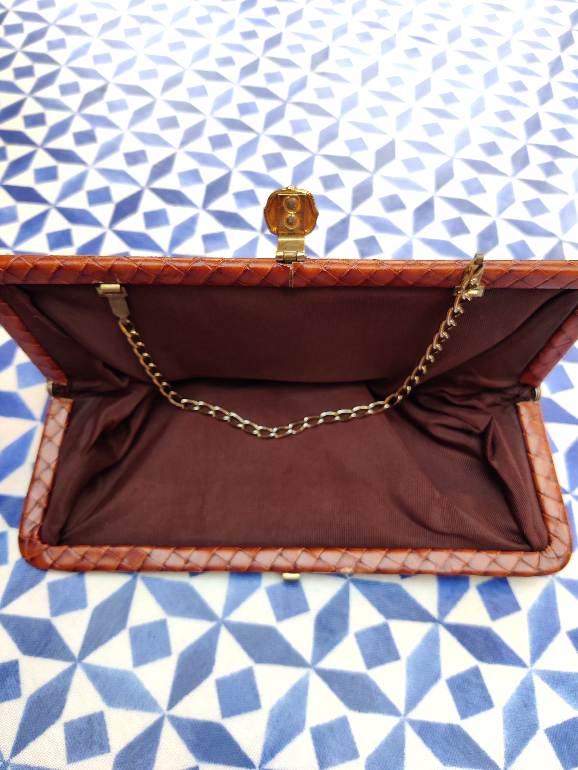 Brown vintage clutch bag with gold clasp