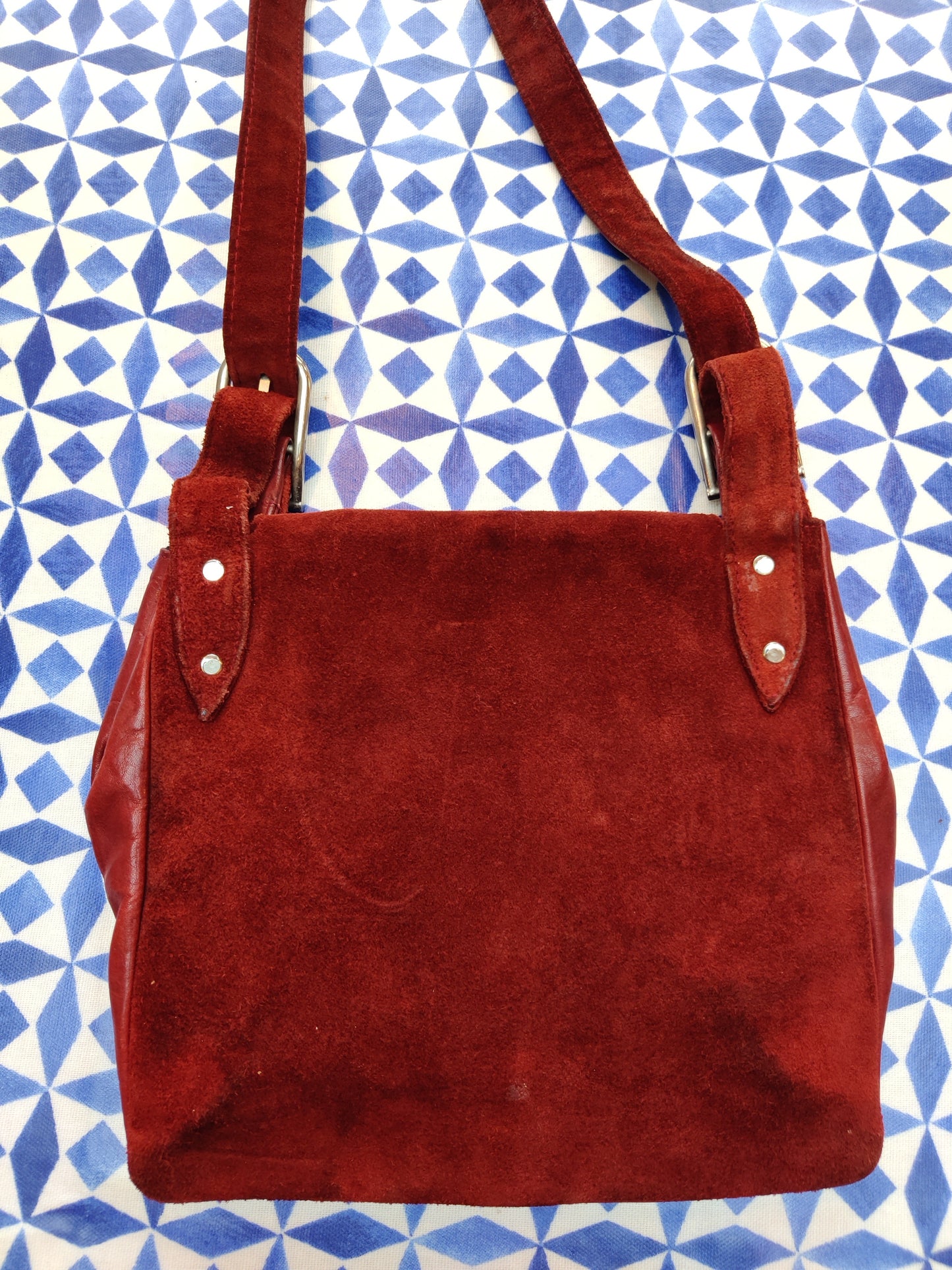 Lovely red suede shoulder bag with gold detail