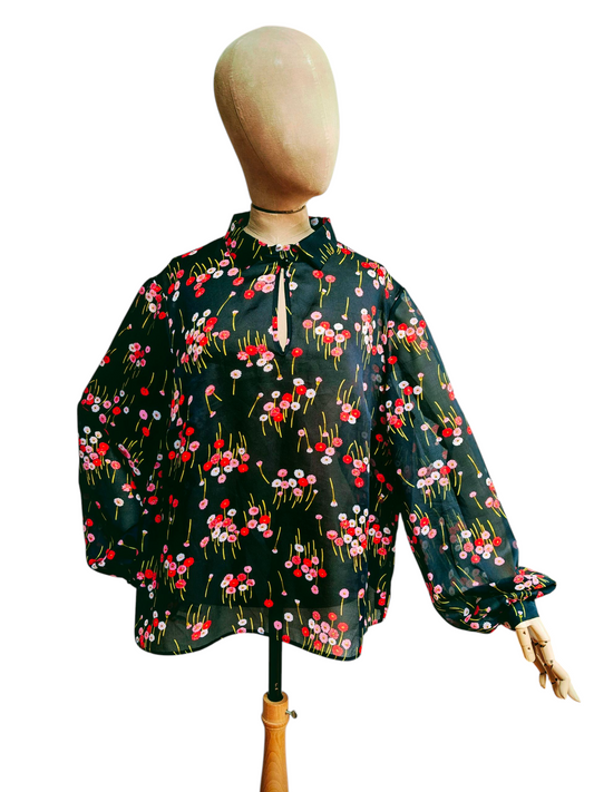 Black and pink daisy blouse with statement sleeves. Size 16.
