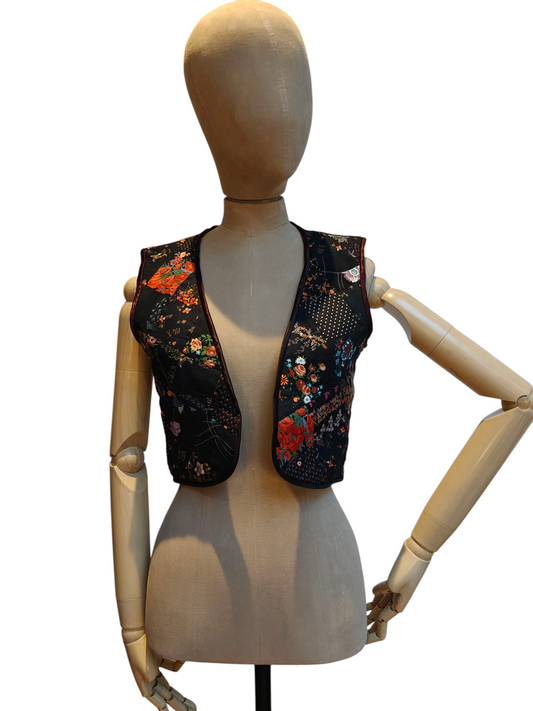 1970's black patchwork quilted waistcoat Small.