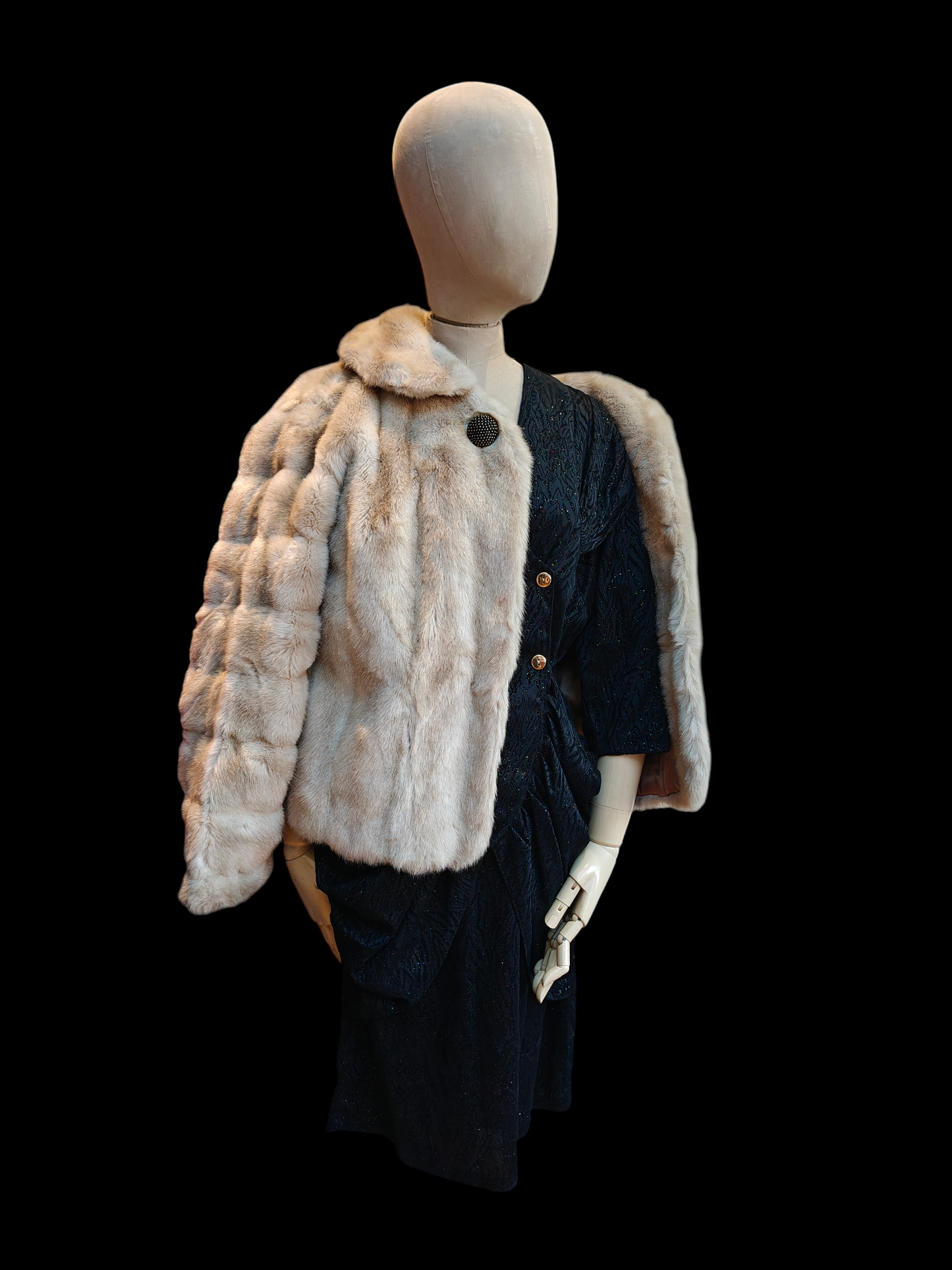 Faux fur jacket with decorative button