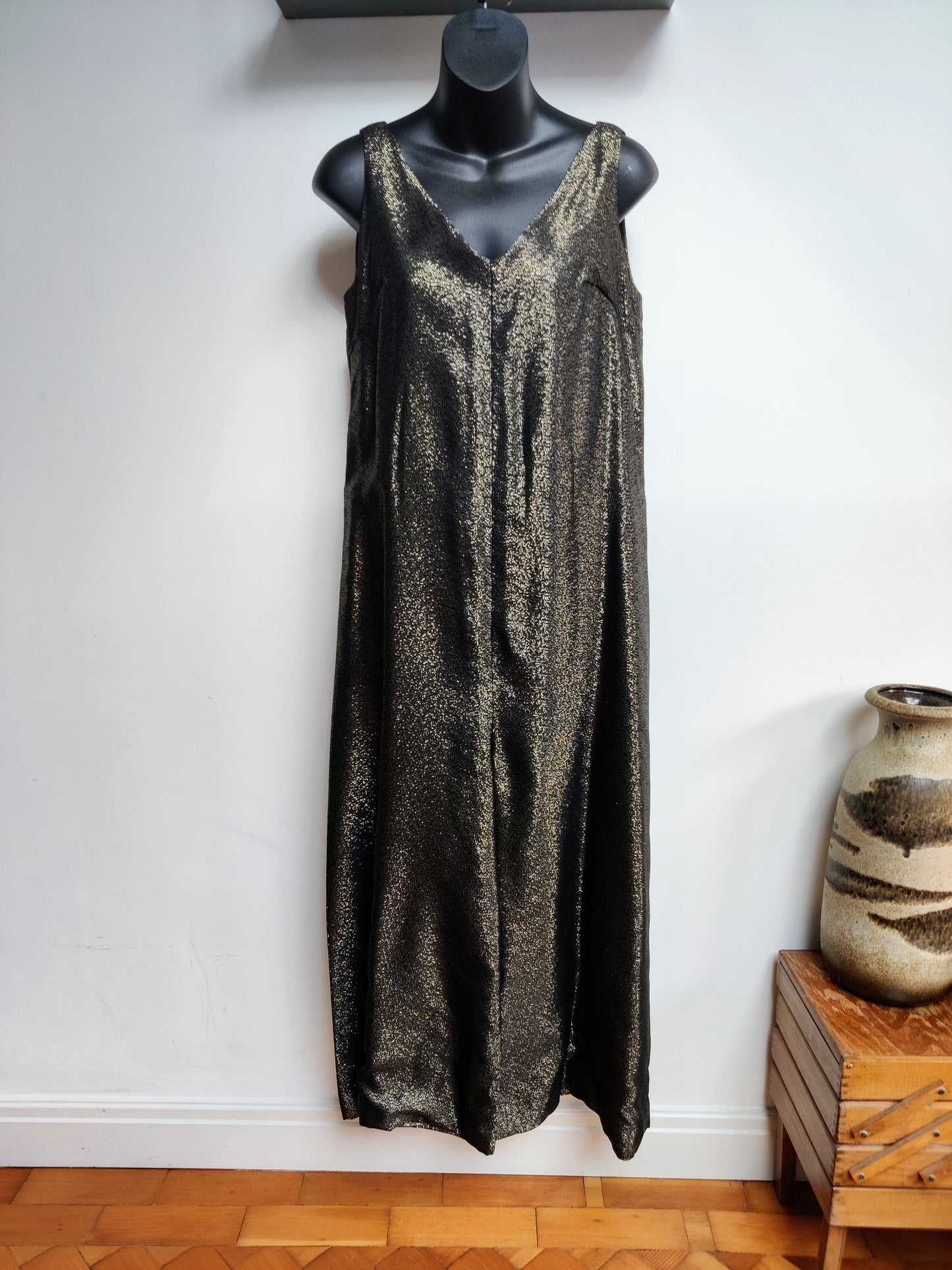 Sparkly gold 70s jumpsuit.