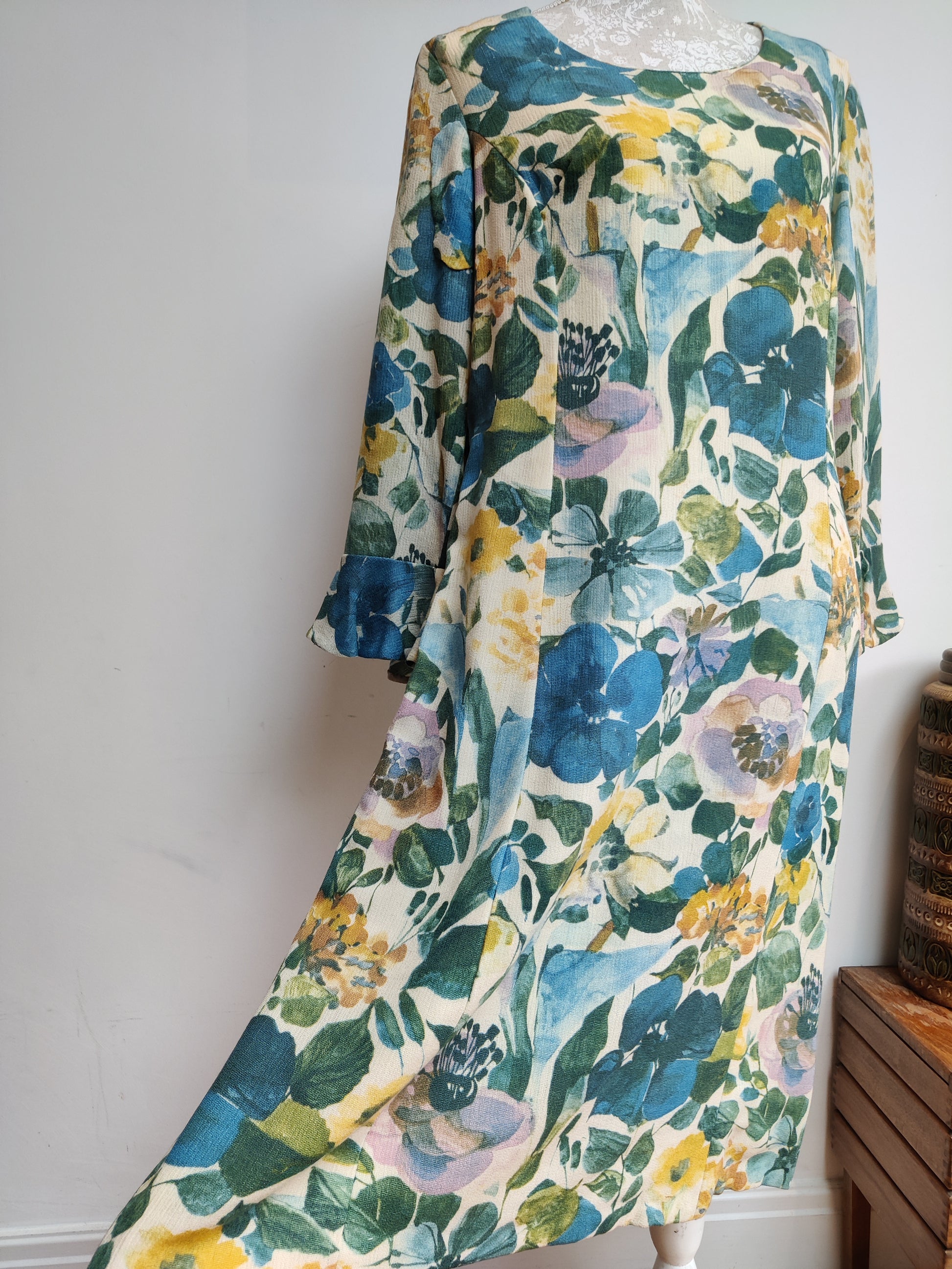 50s floral dress with long flared sleeves.