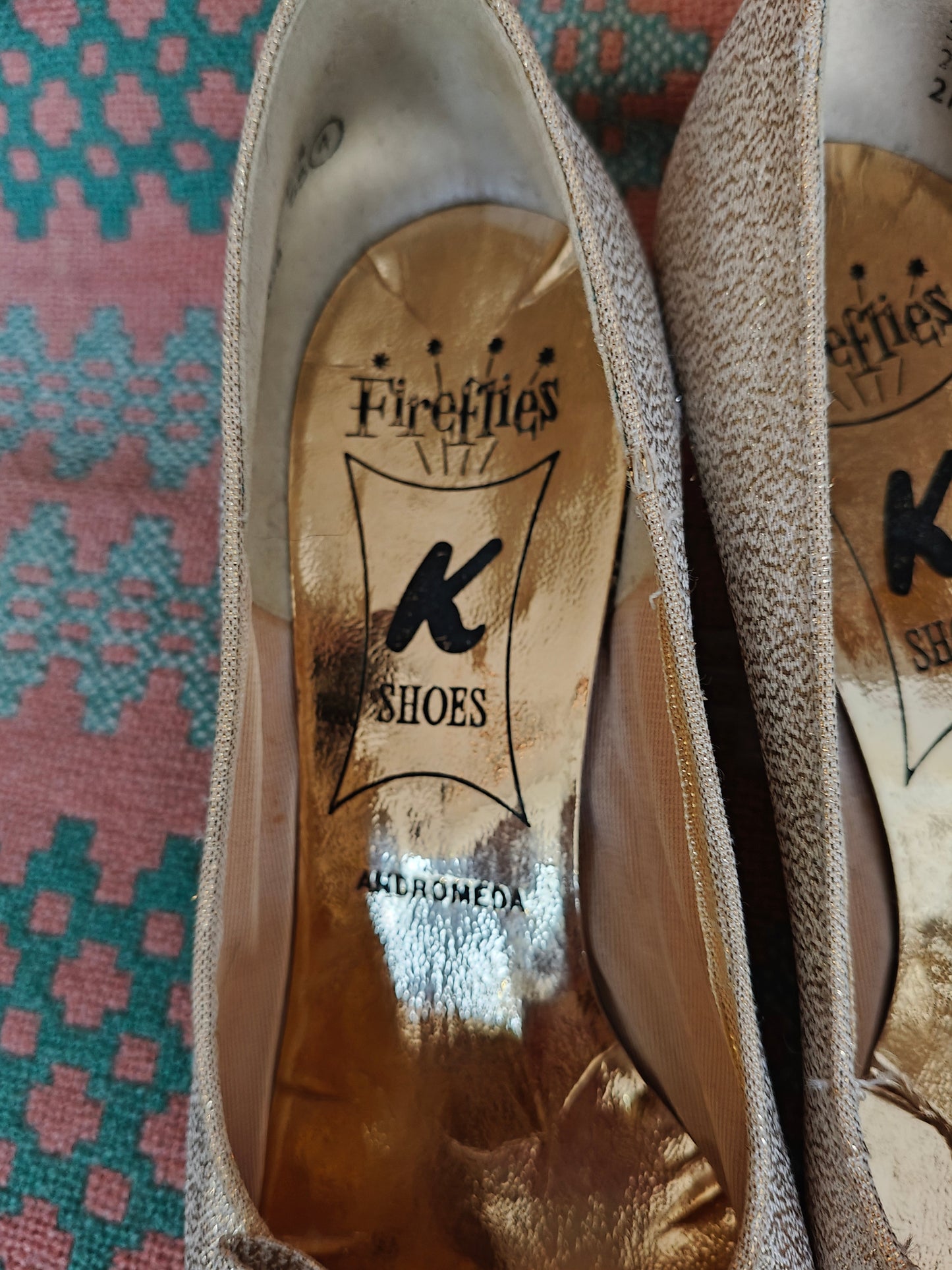 Close-up of a pair of shoes with visible brand name on the insole.
